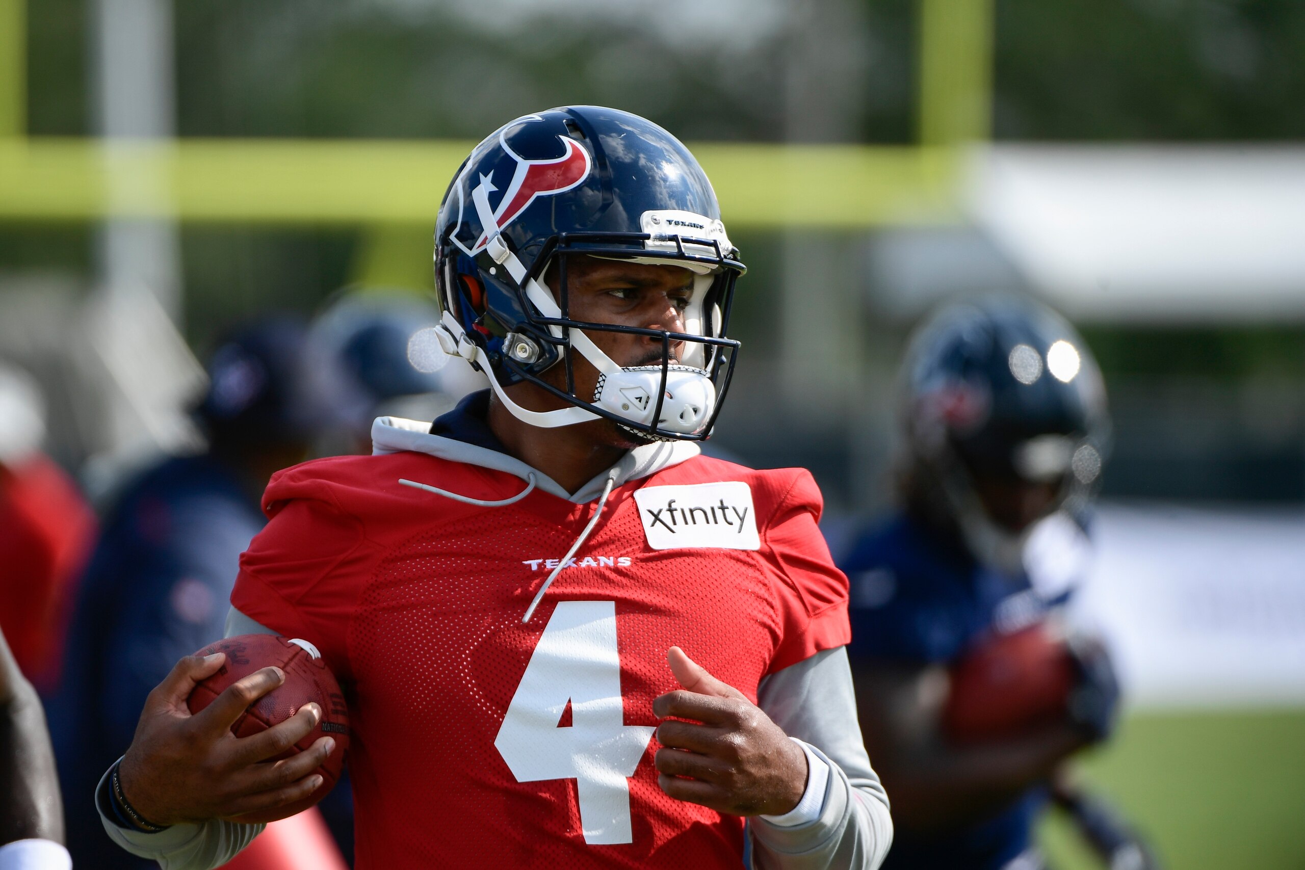Texans quarterback Deshaun Watson (4) runs drills with the team during NFL football practice Thursday, July 29, 2021, in Houston. (AP Photo/Justin Rex)