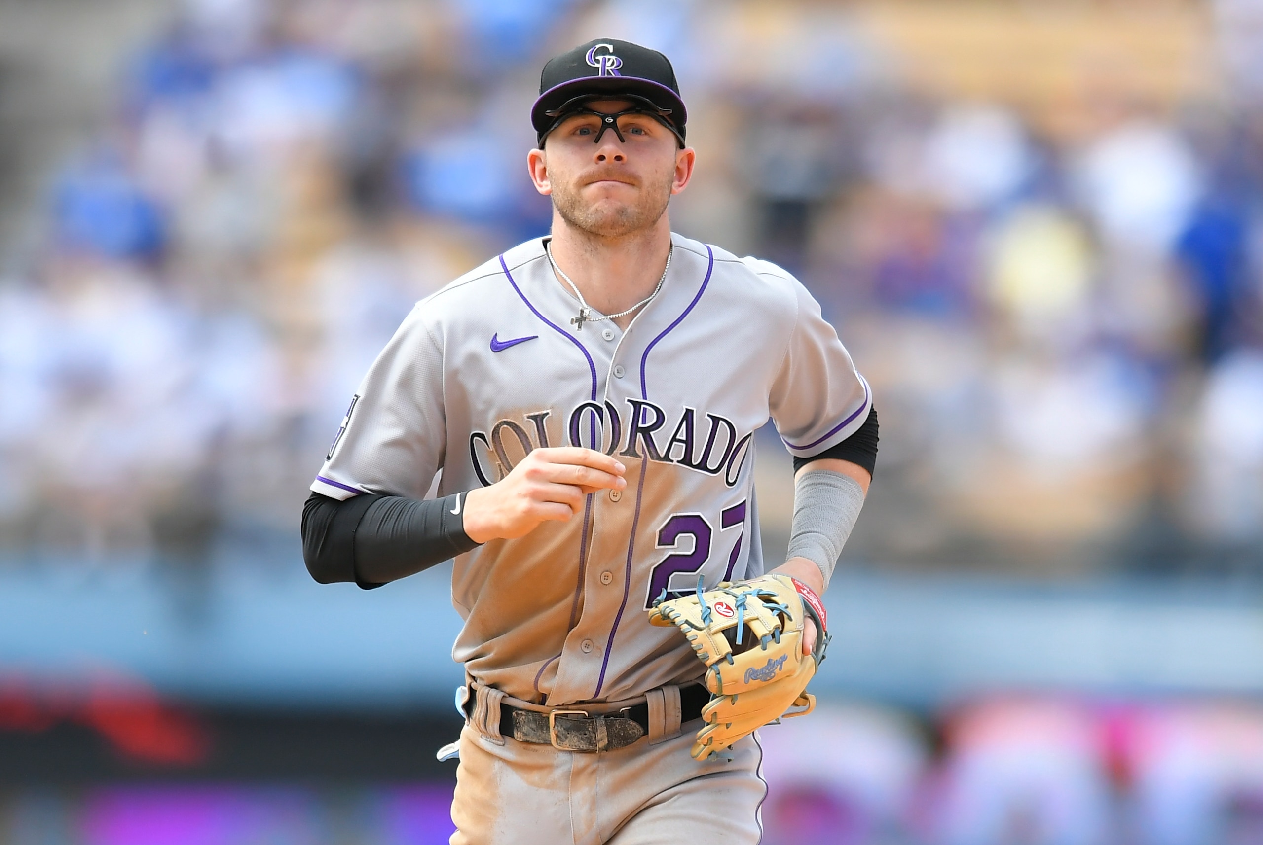 LOS ANGELES, CA - JULY 25: Trevor Story #27 of the Colorado Rockies between innings while playing the Los Angeles Dodgers at Dodger Stadium on July 25, 2021 in Los Angeles, California. (Photo by John McCoy/Getty Images)