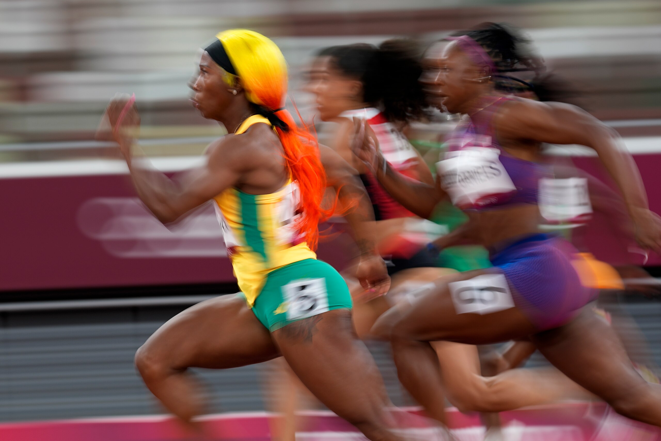 Shelly-Ann Fraser-Pryce, of Jamaica, runs in a semifinal of the women's 100-meters at the 2020 Summer Olympics, Saturday, July 31, 2021, in Tokyo. (AP Photo/David J. Phillip)
