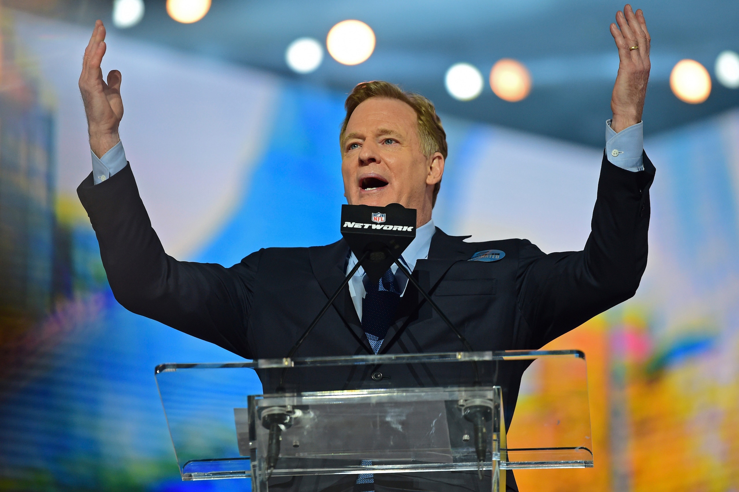NFL commissioner Roger Goodell talks to the crowd at the start of the first round of the NFL football draft Thursday, April 29, 2021, in Cleveland. (AP Photo/David Dermer)
