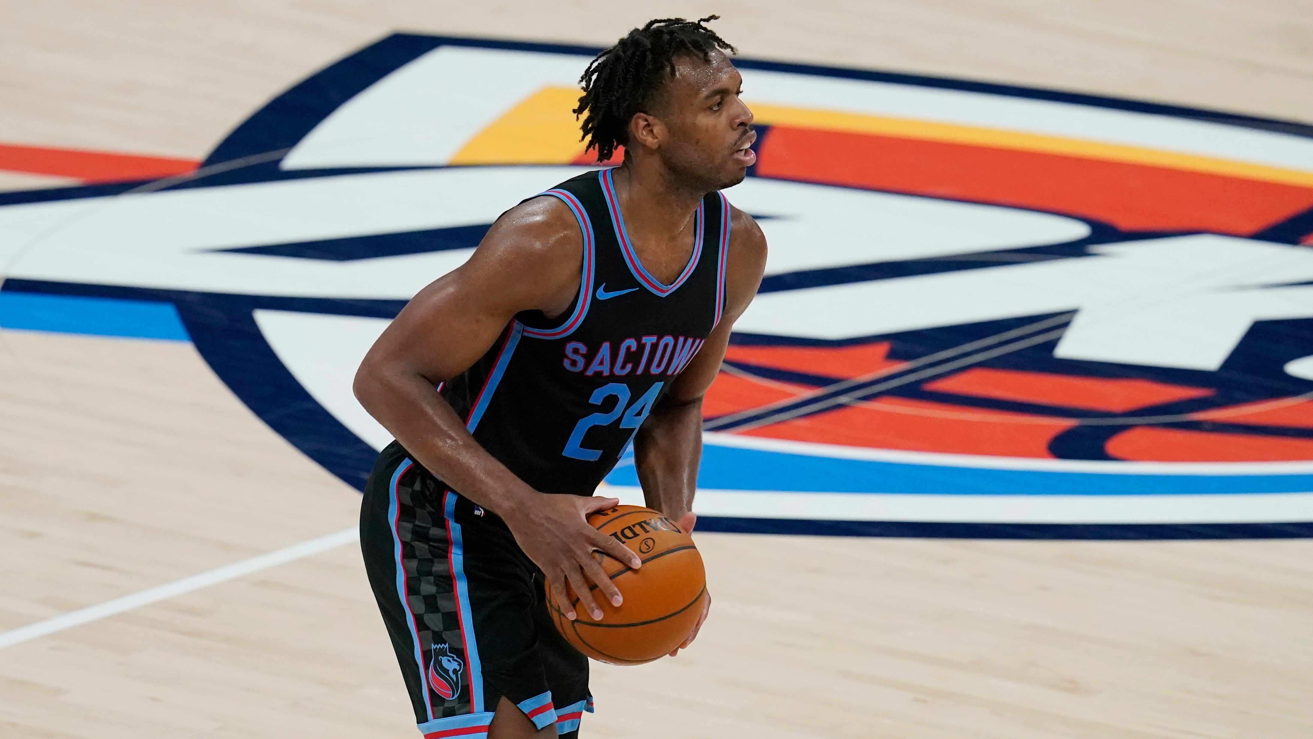 Sacramento Kings guard Buddy Hield during an NBA basketball game against the Oklahoma City Thunder, Tuesday, May 4, 2021, in Oklahoma City. (AP Photo/Sue Ogrocki)