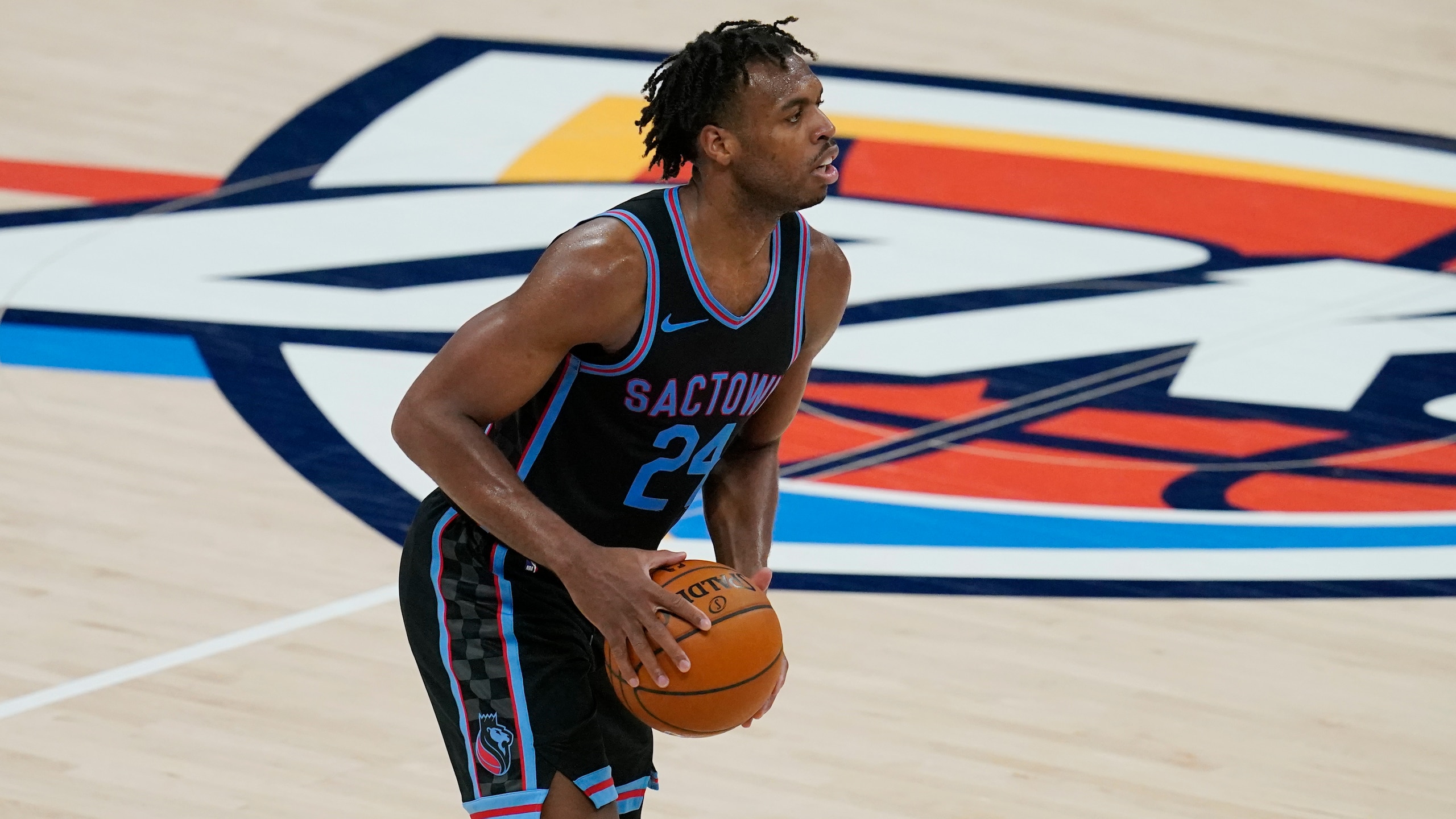 Sacramento Kings guard Buddy Hield during an NBA basketball game against the Oklahoma City Thunder, Tuesday, May 4, 2021, in Oklahoma City. (AP Photo/Sue Ogrocki) Sacramento Kings guard Buddy Hield during an NBA basketball game against the Oklahoma City Thunder, Tuesday, May 4, 2021, in Oklahoma City. (AP Photo/Sue Ogrocki)
