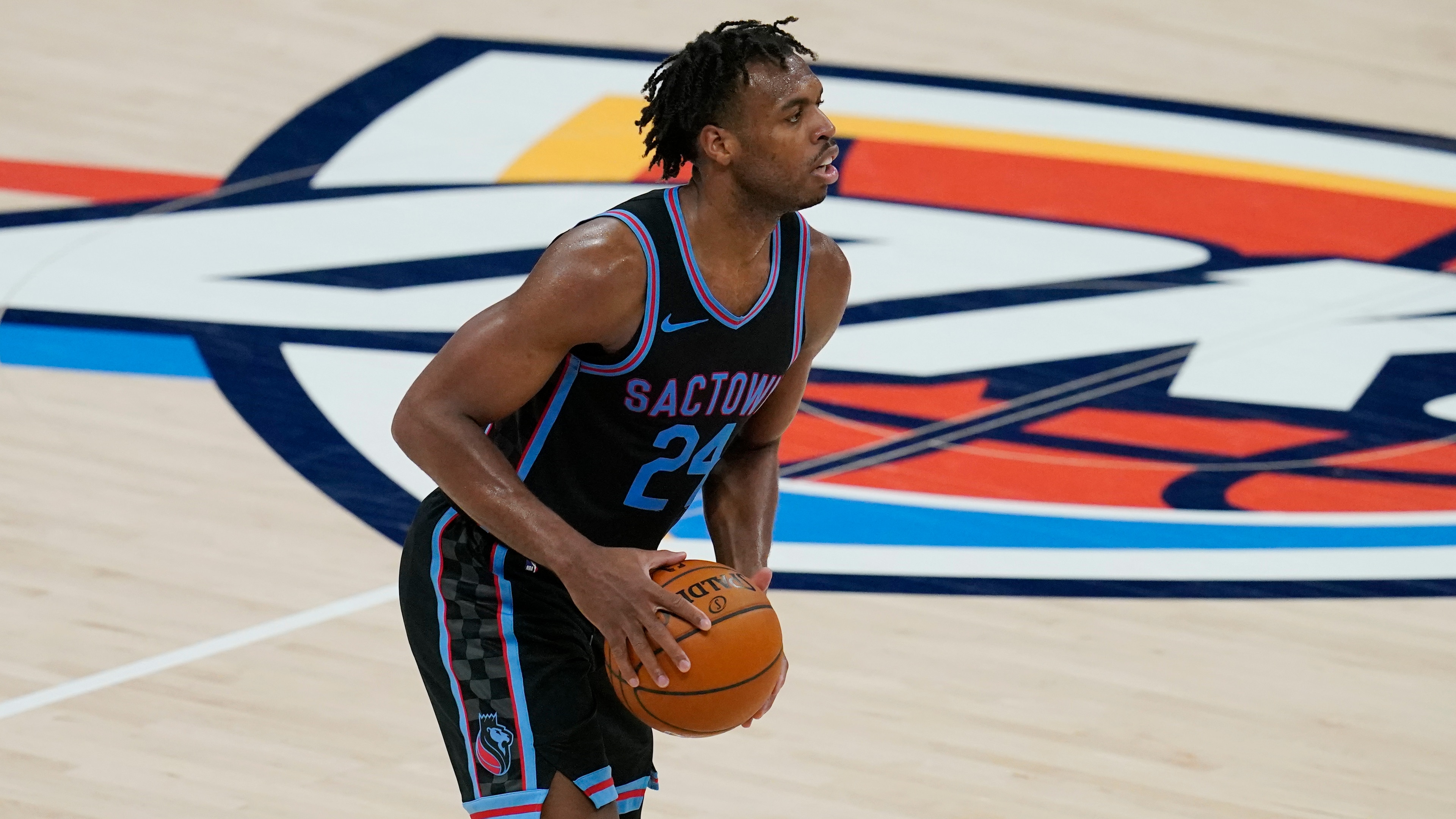 Sacramento Kings guard Buddy Hield during an NBA basketball game against the Oklahoma City Thunder, Tuesday, May 4, 2021, in Oklahoma City. (AP Photo/Sue Ogrocki)