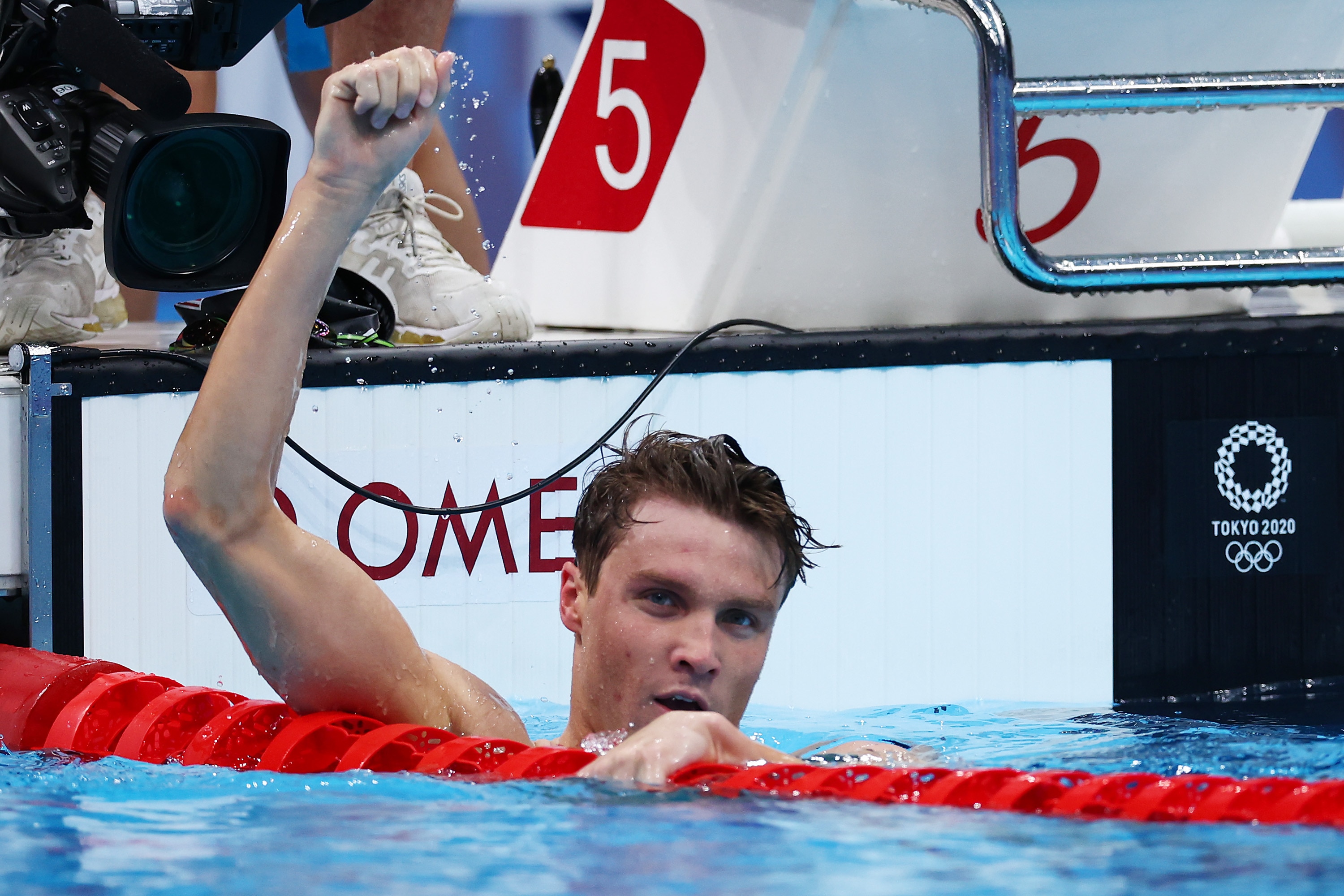 TOKYO, JAPAN - AUGUST 01: Robert Finke of Team United States reacts after winning the gold medal in the Men's 1500m Freestyle Final on day nine of the Tokyo 2020 Olympic Games at Tokyo Aquatics Centre on August 01, 2021 in Tokyo, Japan. (Photo by Maddie Meyer/Getty Images)