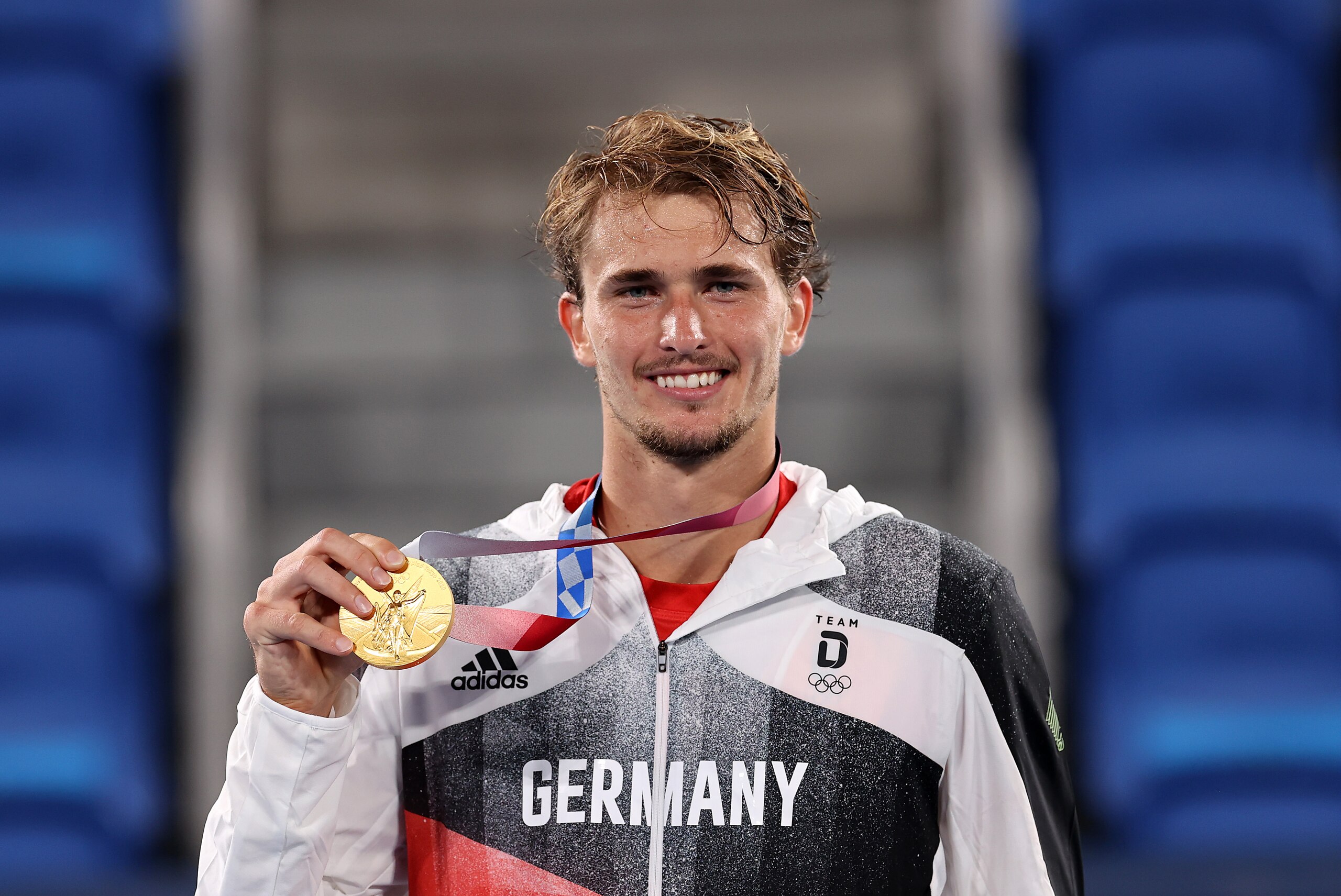 TOKYO, JAPAN - AUGUST 01: Gold medalist Alexander Zverev of Team Germany poses on the podium during the medal ceremony for Tennis Men's Singles on day nine of the Tokyo 2020 Olympic Games at Ariake Tennis Park on August 01, 2021 in Tokyo, Japan. (Photo by Clive Brunskill/Getty Images)