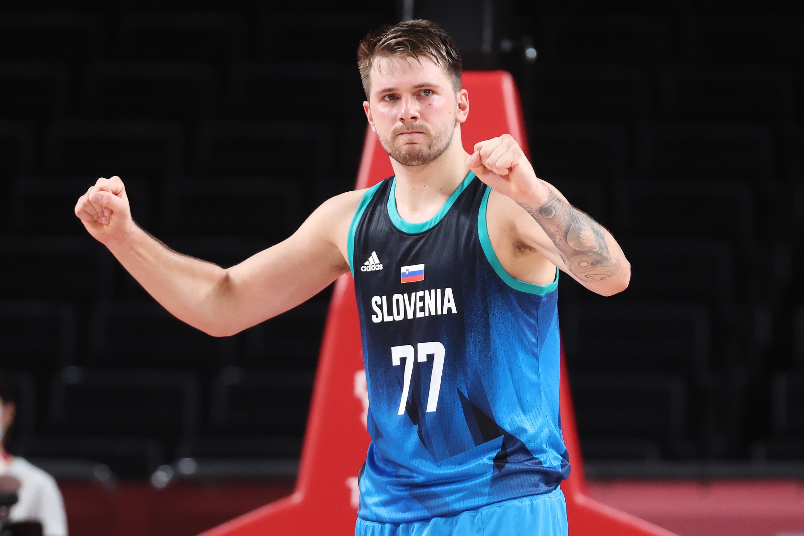 SAITAMA, JAPAN - AUGUST 01: Luka Doncic #77 of Team Slovenia celebrates after Slovenia defeated Team Spain in a Men's Basketball Preliminary Round Group C game at Saitama Super Arena on August 01, 2021 in Saitama, Japan. (Photo by Gregory Shamus/Getty Images)