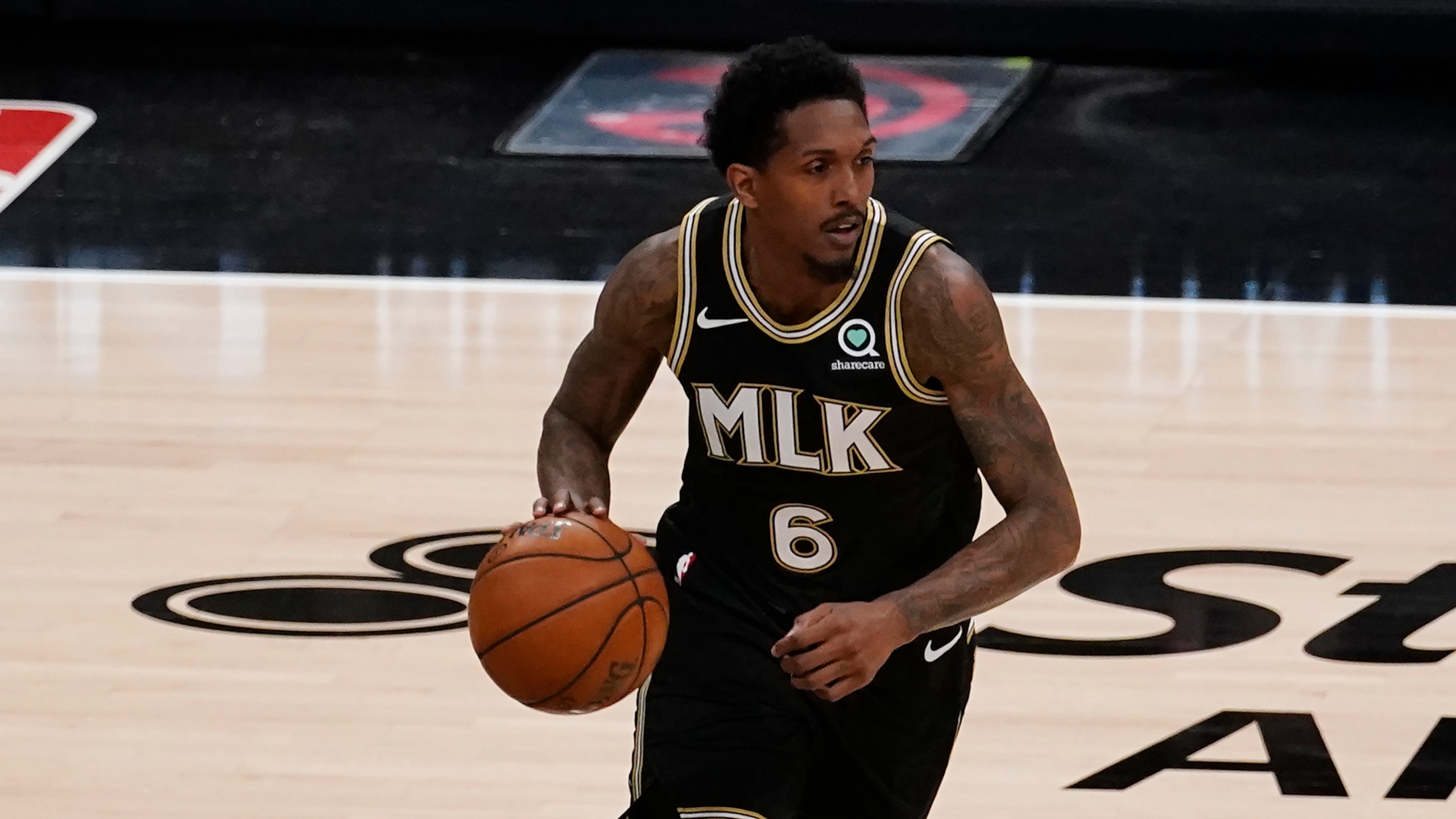 Atlanta Hawks guard Lou Williams (6) is shown against the Milwaukee Bucks during the first half of their NBA Eastern Conference Finals playoff series basketball game Saturday, July 3, 2021, in Atlanta. (AP Photo/John Bazemore)