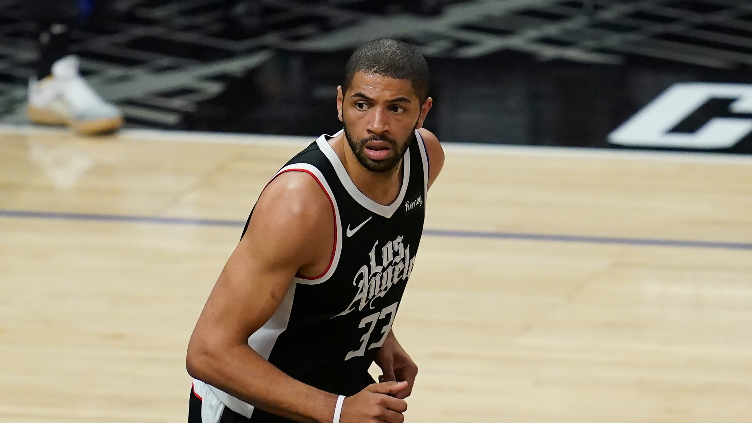 Los Angeles Clippers forward Nicolas Batum (33) reacts after scoring during Game 7 of an NBA basketball first-round playoff series against the Dallas Mavericks Sunday, June 6, 2021, in Los Angeles, Calif. (AP Photo/Ashley Landis)