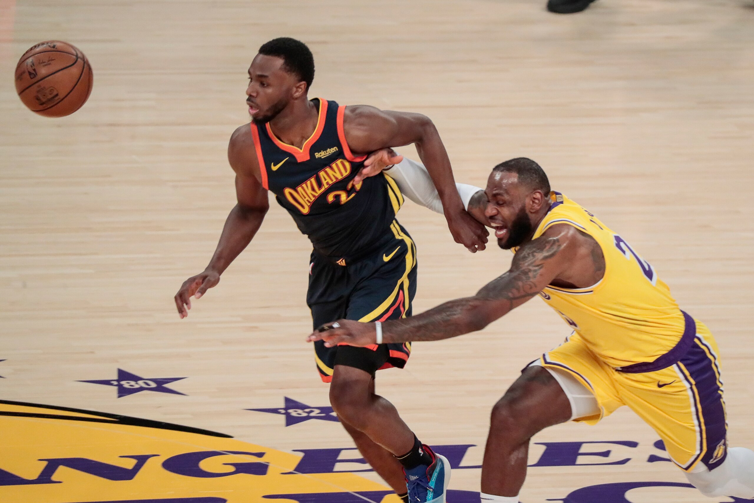 Los Angeles, CA, Wednesday, May 19, 2021  LeBron James knocks the ball away from Warriors forward Andrew Wiggins during first half action in a Pay-In game at Staples Center. Robert Gauthier/Los Angeles Times via Getty Images)