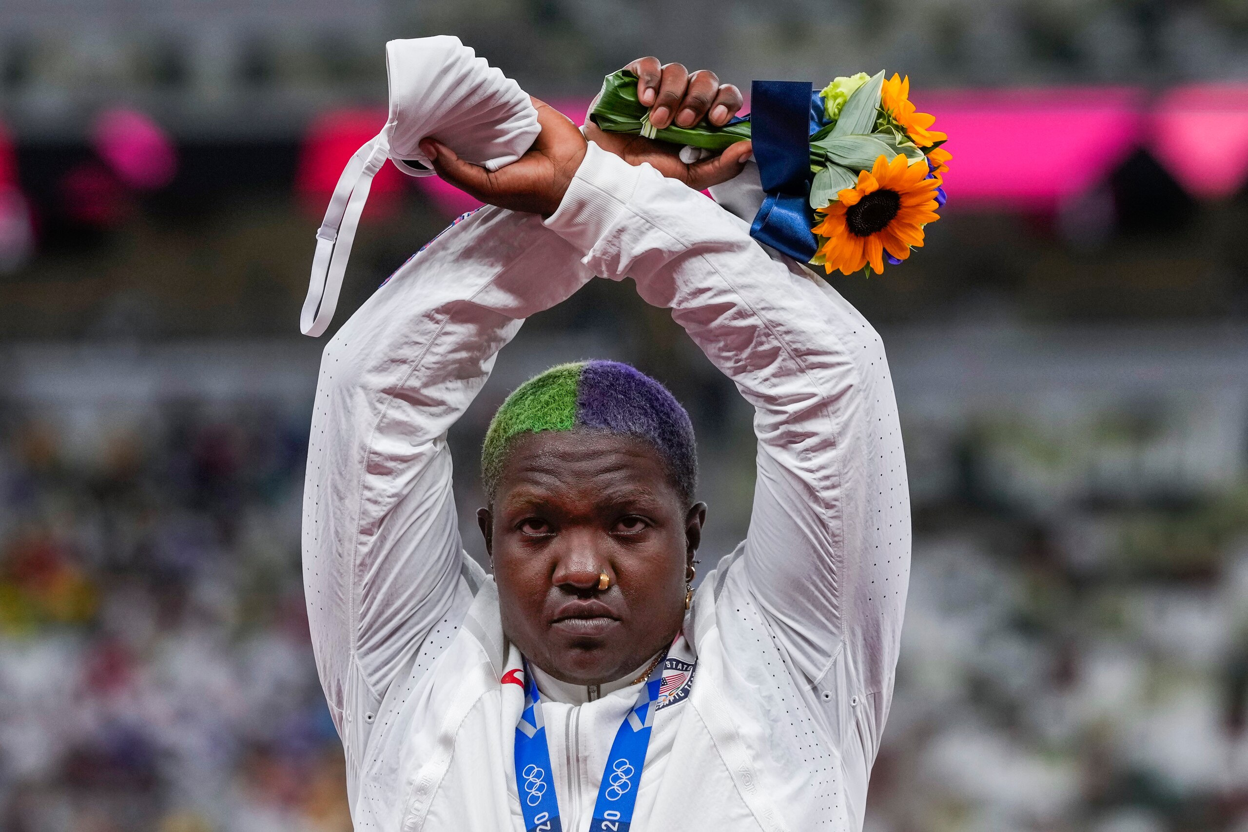 Raven Saunders, of the United States, poses with her silver medal on women's shot put at the 2020 Summer Olympics, Sunday, Aug. 1, 2021, in Tokyo, Japan. During the photo op at her medals ceremony Sunday night, Saunders stepped off the podium, lifted her arms above her head and formed an “X’ with her wrists. Asked what that meant, she explained: ”It’s the intersection of where all people who are oppressed meet.” (AP Photo/Francisco Seco) Raven Saunders, of the United States, poses with her silver medal on women's shot put at the 2020 Summer Olympics, Sunday, Aug. 1, 2021, in Tokyo, Japan. During the photo op at her medals ceremony Sunday night, Saunders stepped off the podium, lifted her arms above her head and formed an “X’ with her wrists. Asked what that meant, she explained: ”It’s the intersection of where all people who are oppressed meet.” (AP Photo/Francisco Seco)