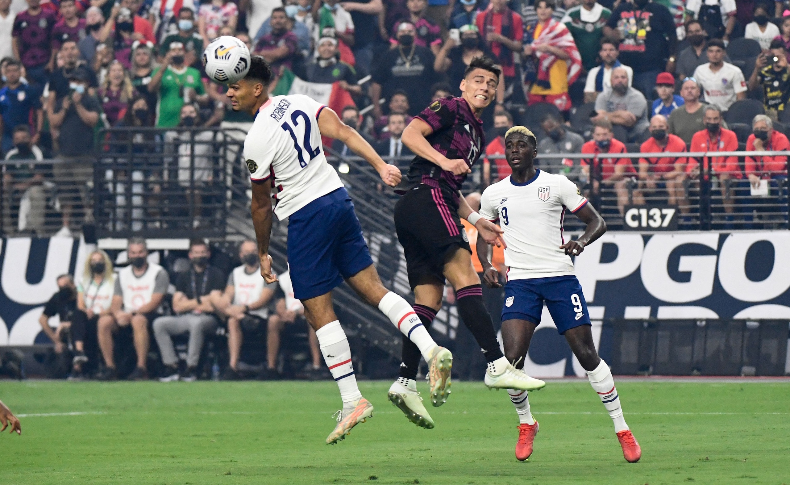 USA's defender Miles Robinson heads the ball during the Concacaf Gold Cup football match final between Mexico and USA at the Allegiant stadium in Las Vegas, Nevada on August 1, 2021. (Photo by Patrick T. FALLON / AFP) (Photo by PATRICK T. FALLON/AFP via Getty Images)