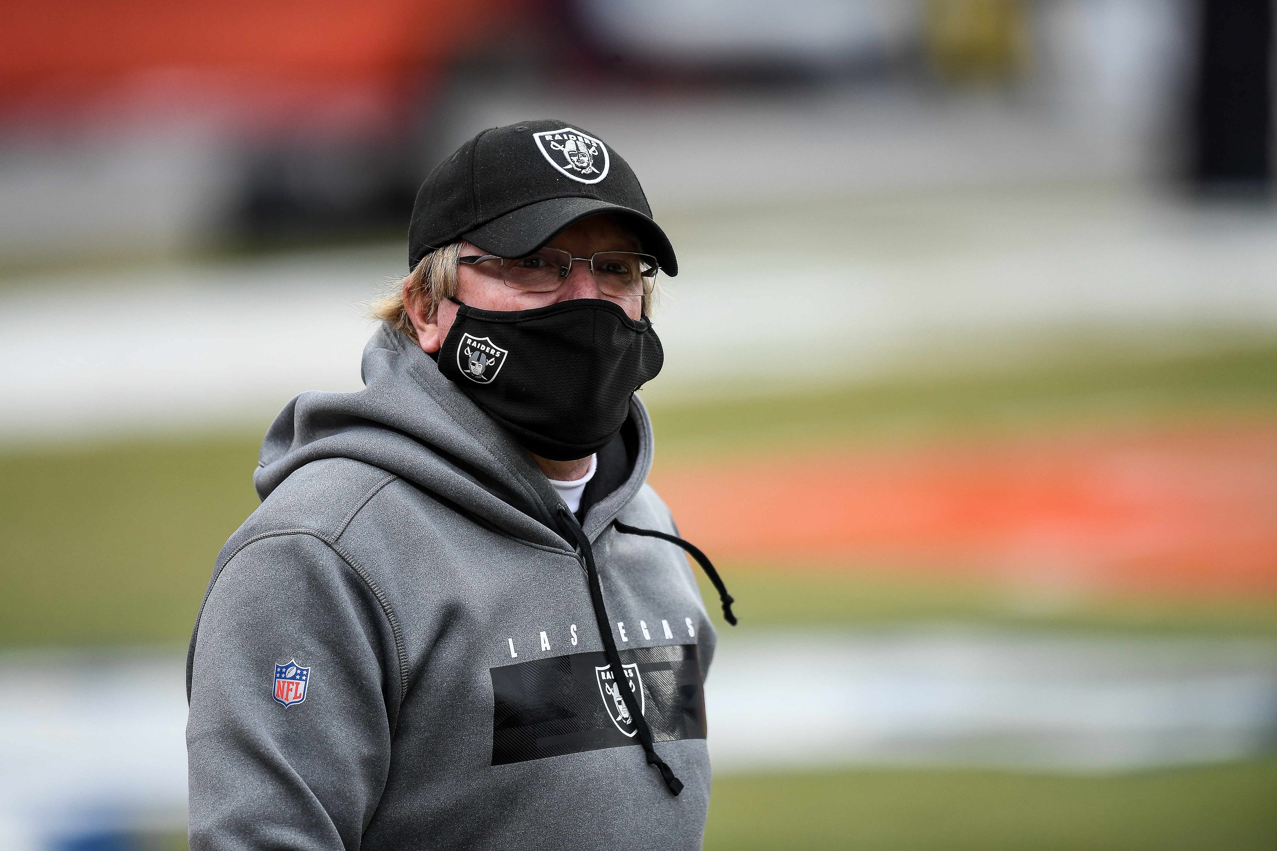 DENVER, CO - JANUARY 03: Las Vegas Raiders head coach Jon Gruden walks onto the field before a game between the Denver Broncos and the Las Vegas Raiders at Empower Field at Mile High on January 3, 2021 in Denver, Colorado. (Photo by Dustin Bradford/Icon Sportswire via Getty Images) DENVER, CO - JANUARY 03: Las Vegas Raiders head coach Jon Gruden walks onto the field before a game between the Denver Broncos and the Las Vegas Raiders at Empower Field at Mile High on January 3, 2021 in Denver, Colorado. (Photo by Dustin Bradford/Icon Sportswire via Getty Images)