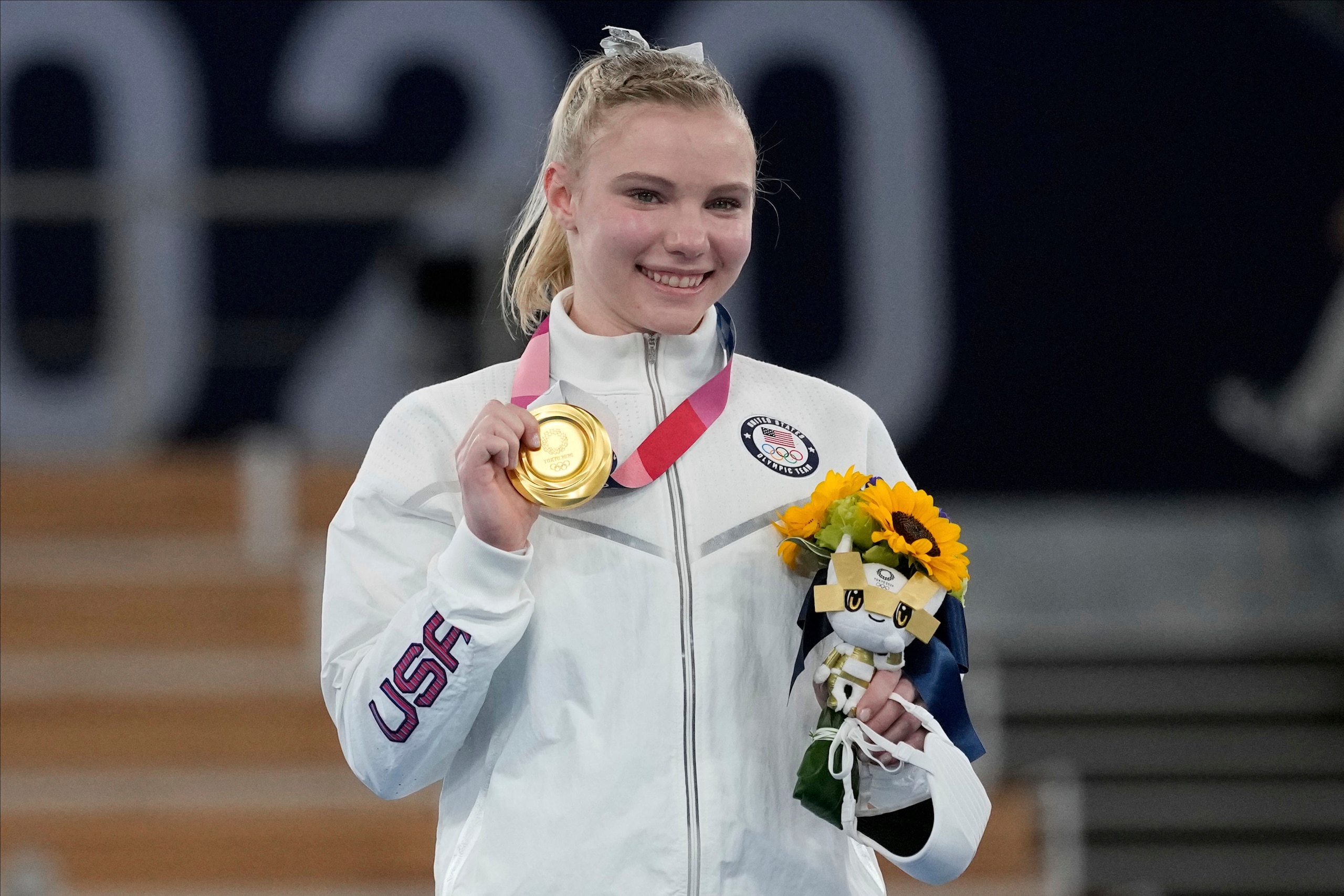Jade Carey, of the United States, poses after winning the gold medal for the floor exercise during the artistic gymnastics women's apparatus final at the 2020 Summer Olympics, Monday, Aug. 2, 2021, in Tokyo, Japan. (AP Photo/Ashley Landis)