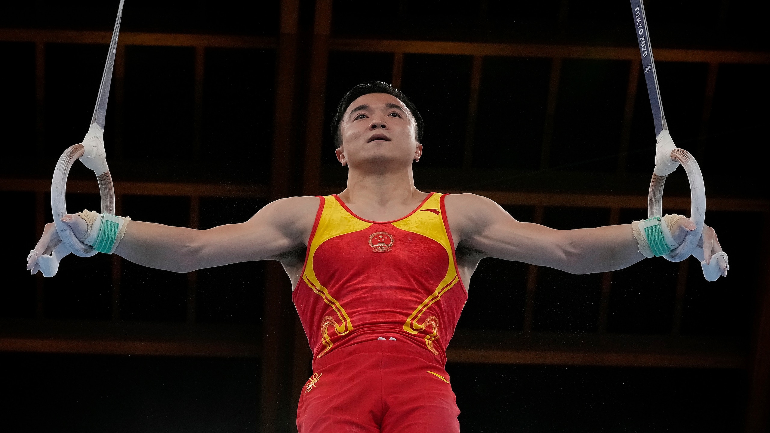 Liu Yang, of China, performs on the rings during the artistic gymnastics men's apparatus final at the 2020 Summer Olympics, Monday, Aug. 2, 2021, in Tokyo, Japan. (AP Photo/Ashley Landis)