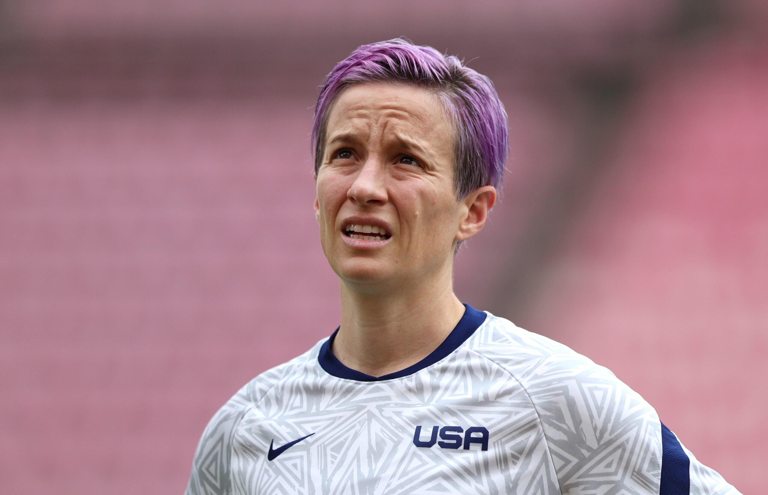 KASHIMA, JAPAN - AUGUST 02: Megan Rapinoe #15 of Team United States looks on as she warms up prior to the Women's Semi-Final match between USA and Canada on day ten of the Tokyo Olympic Games at Kashima Stadium on August 02, 2021 in Kashima, Ibaraki, Japan. (Photo by Naomi Baker/Getty Images)