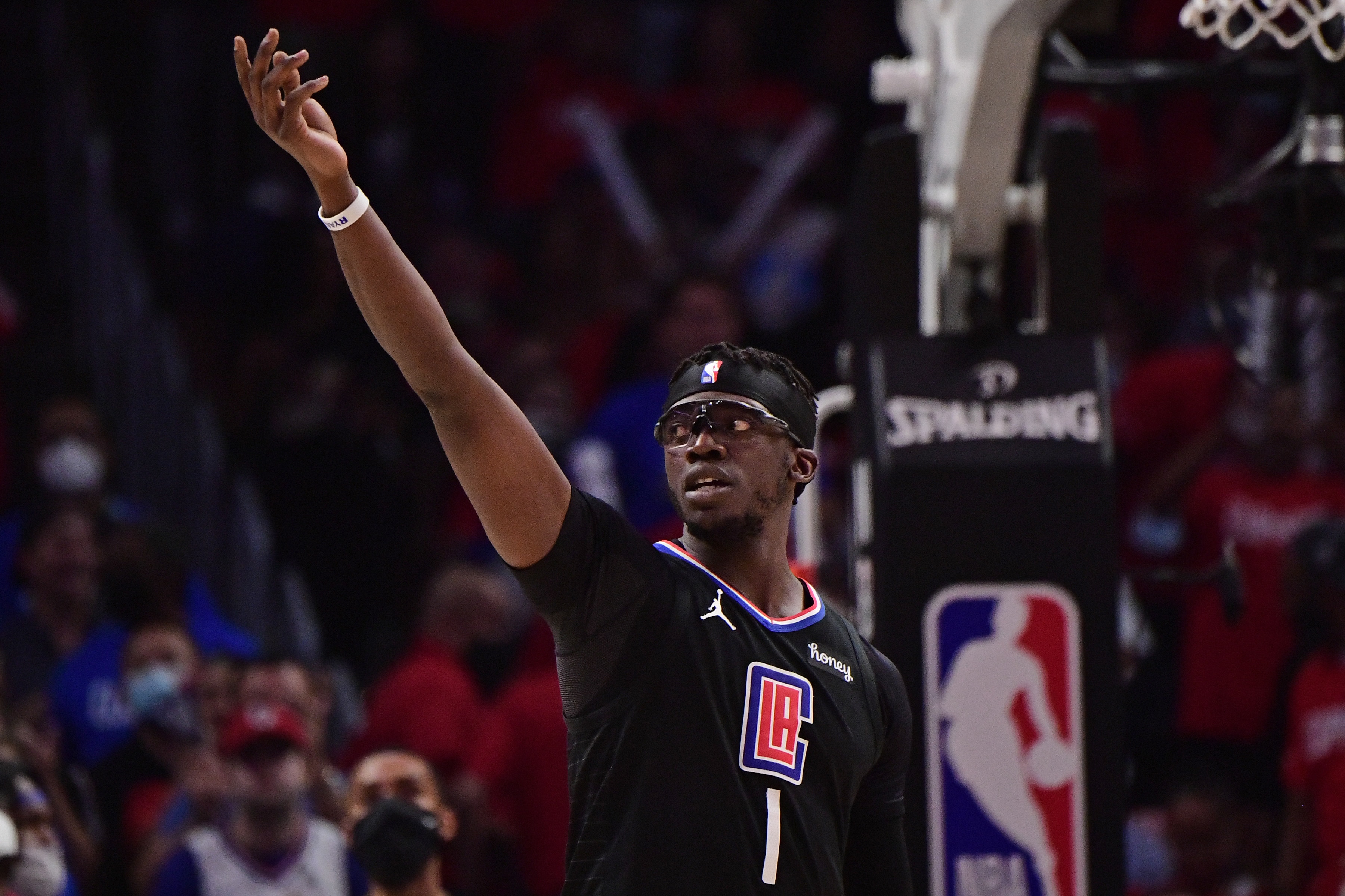 LOS ANGELES, CA - JUNE 30: Reggie Jackson #1 of the LA Clippers looks on during Game 6 of the Western Conference Finals of the 2021 NBA Playoffs on June 30, 2021 at STAPLES Center in Los Angeles, California. NOTE TO USER: User expressly acknowledges and agrees that, by downloading and/or using this Photograph, user is consenting to the terms and conditions of the Getty Images License Agreement. Mandatory Copyright Notice: Copyright 2021 NBAE (Photo by Adam Pantozzi/NBAE via Getty Images)