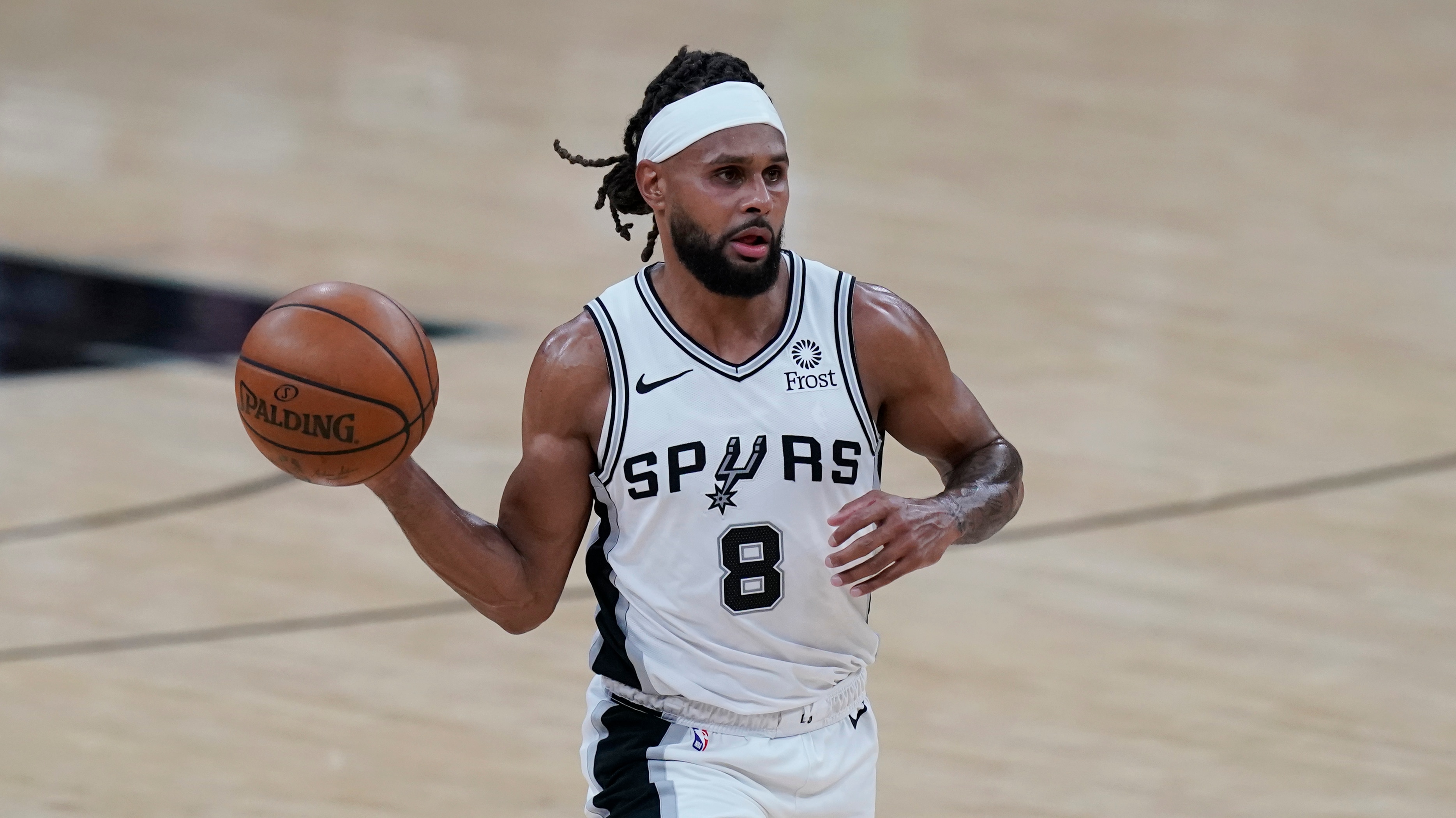 San Antonio Spurs guard Patty Mills (8) during the second half of an NBA basketball game against the Phoenix Suns in San Antonio, Saturday, May 15, 2021. (AP Photo/Eric Gay)