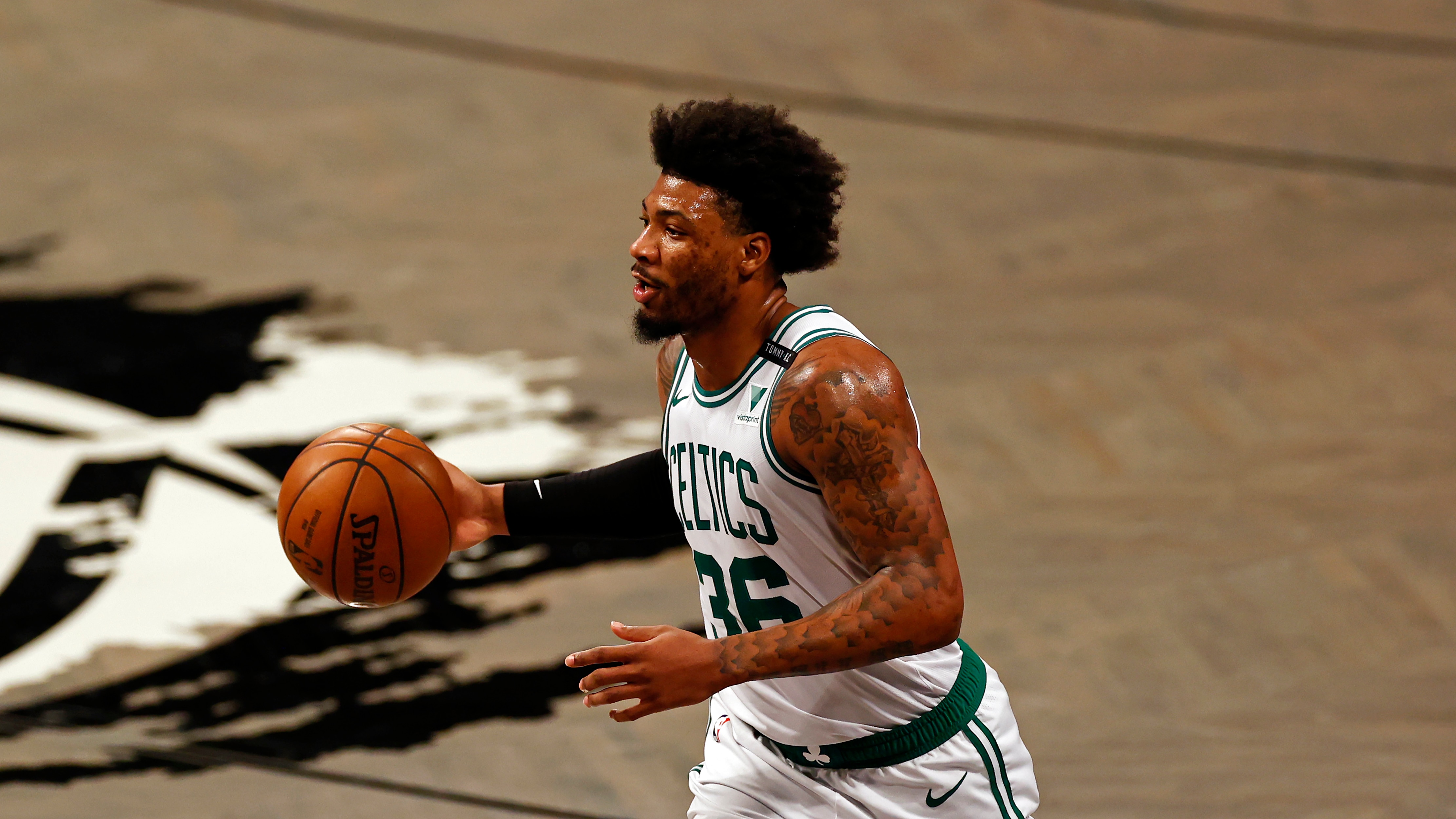 Boston Celtics guard Marcus Smart (36) in action against the Brooklyn Nets in the first half of Game 5 during an NBA basketball first-round playoff series, Tuesday, June 1, 2021, in New York. (AP Photo/Adam Hunger)