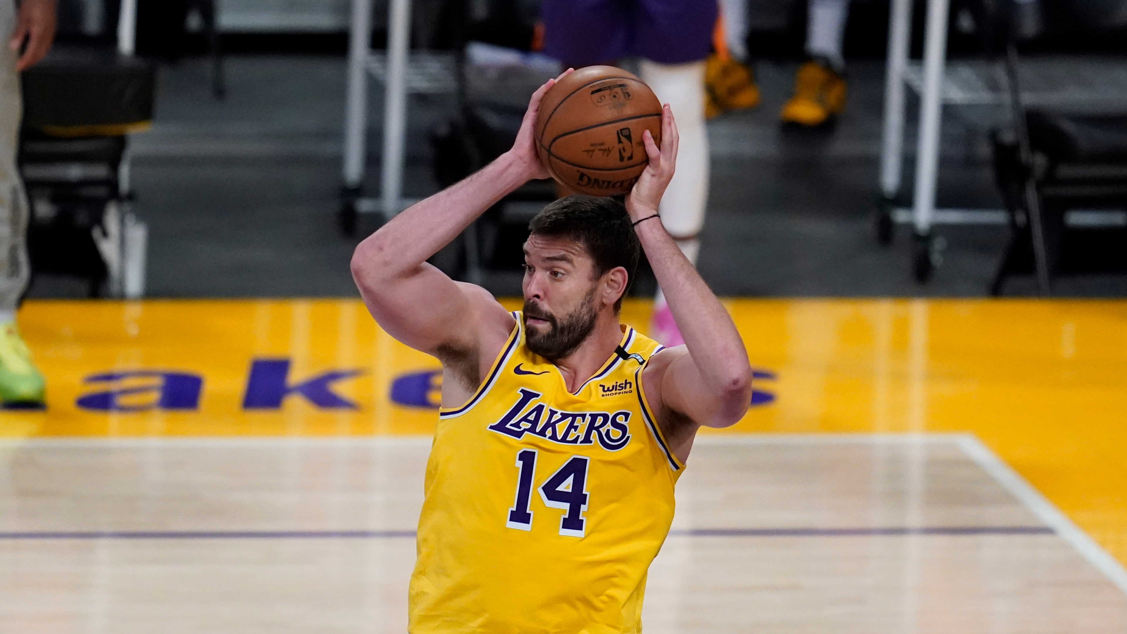 Los Angeles Lakers center Marc Gasol (14) passes the ball during Game 6 of an NBA basketball first-round playoff series against the Phoenix Suns Thursday, Jun 3, 2021, in Los Angeles. (AP Photo/Ashley Landis)