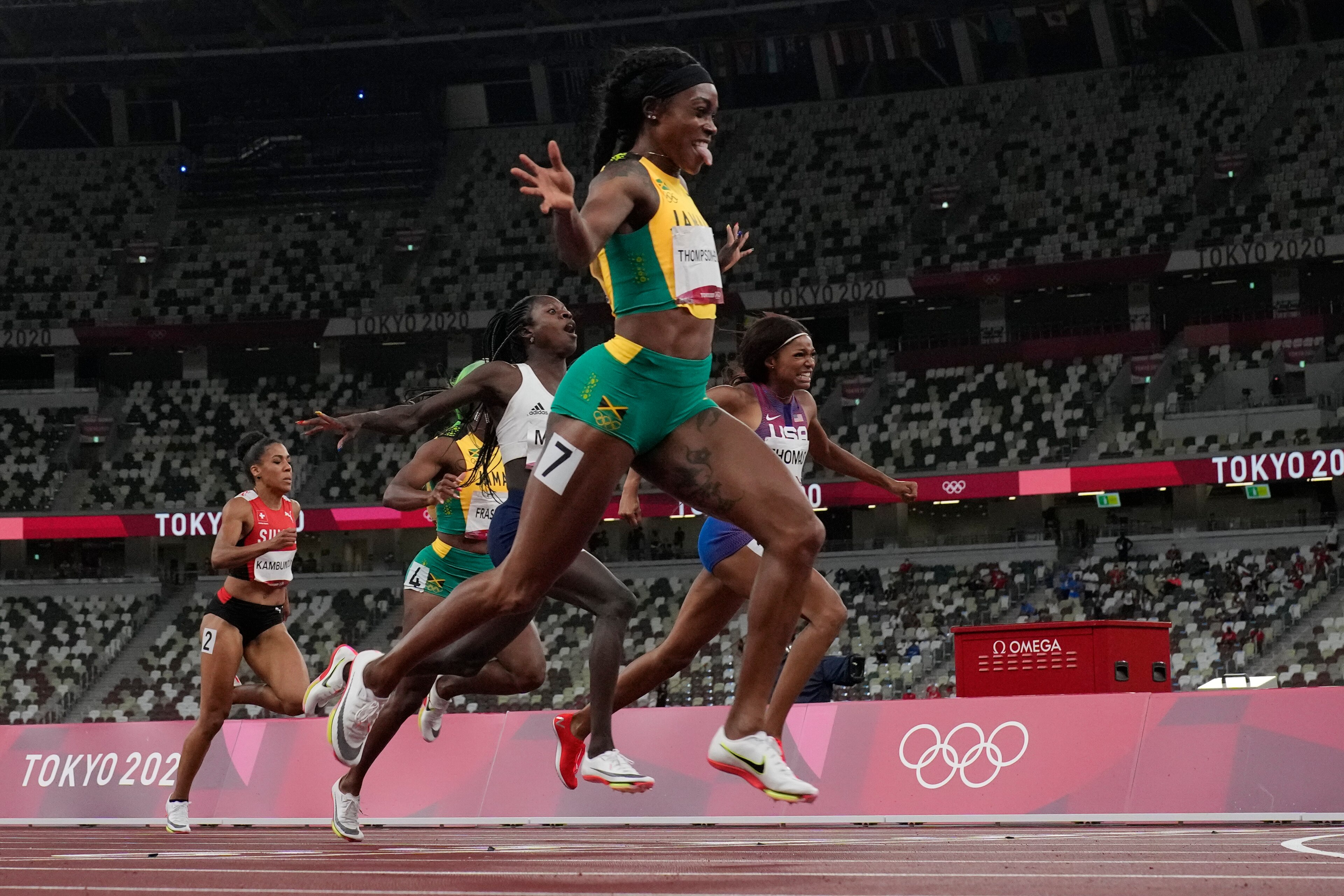 Elaine Thompson-Herah, of Jamaica, wins the final of the women's 200-meters at the 2020 Summer Olympics, Tuesday, Aug. 3, 2021, in Tokyo. (AP Photo/David J. Phillip)