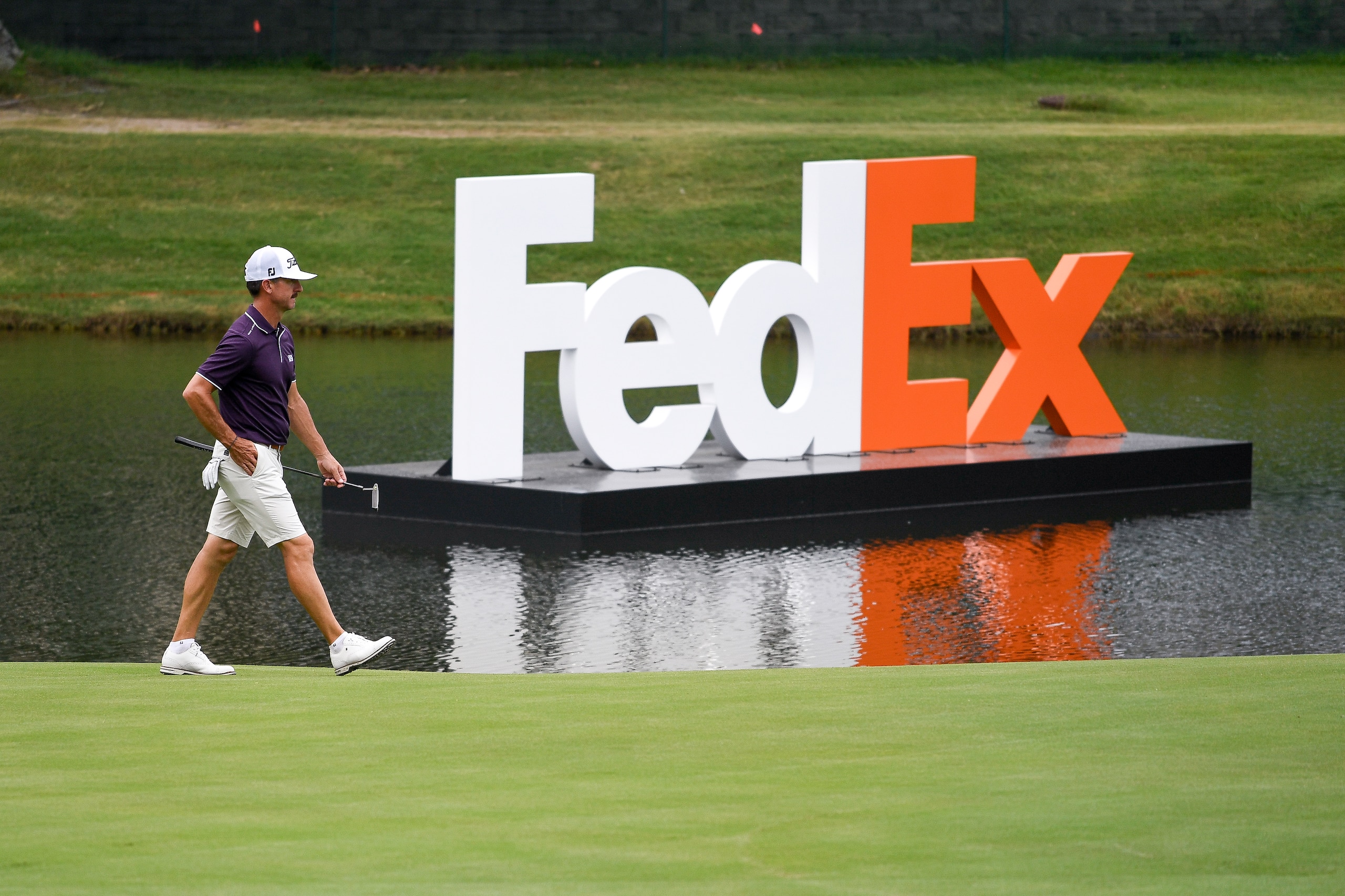 MEMPHIS, TN - AUGUST 02: Wade Ormsby of Australia walks pas giant FedEx letters at the 18th hole prior to the World Golf Championships-FedEx St. Jude Invitational at TPC Southwind on August 2, 2021 in Memphis, Tennessee. (Photo by Tracy Wilcox/PGA TOUR via Getty Images)