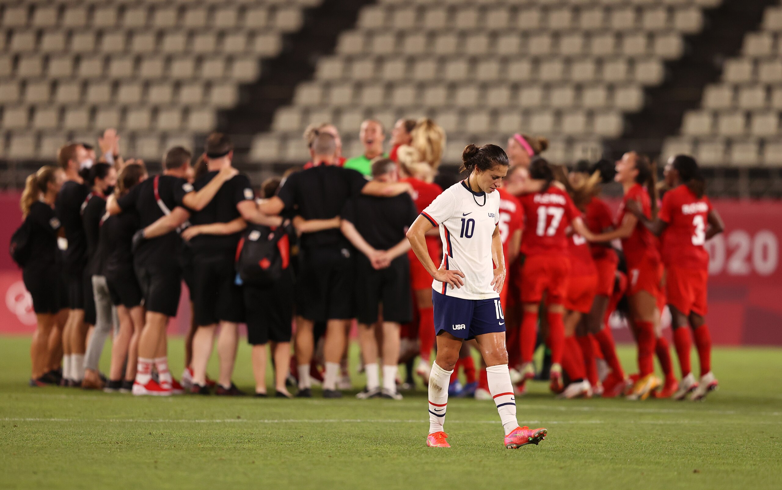 KASHIMA, JAPAN - AUGUST 02: Carli Lloyd #10 of Team United States looks dejected following defeat in the Women's Semi-Final match between USA and Canada on day ten of the Tokyo Olympic Games at Kashima Stadium on August 02, 2021 in Kashima, Ibaraki, Japan. (Photo by Francois Nel/Getty Images)