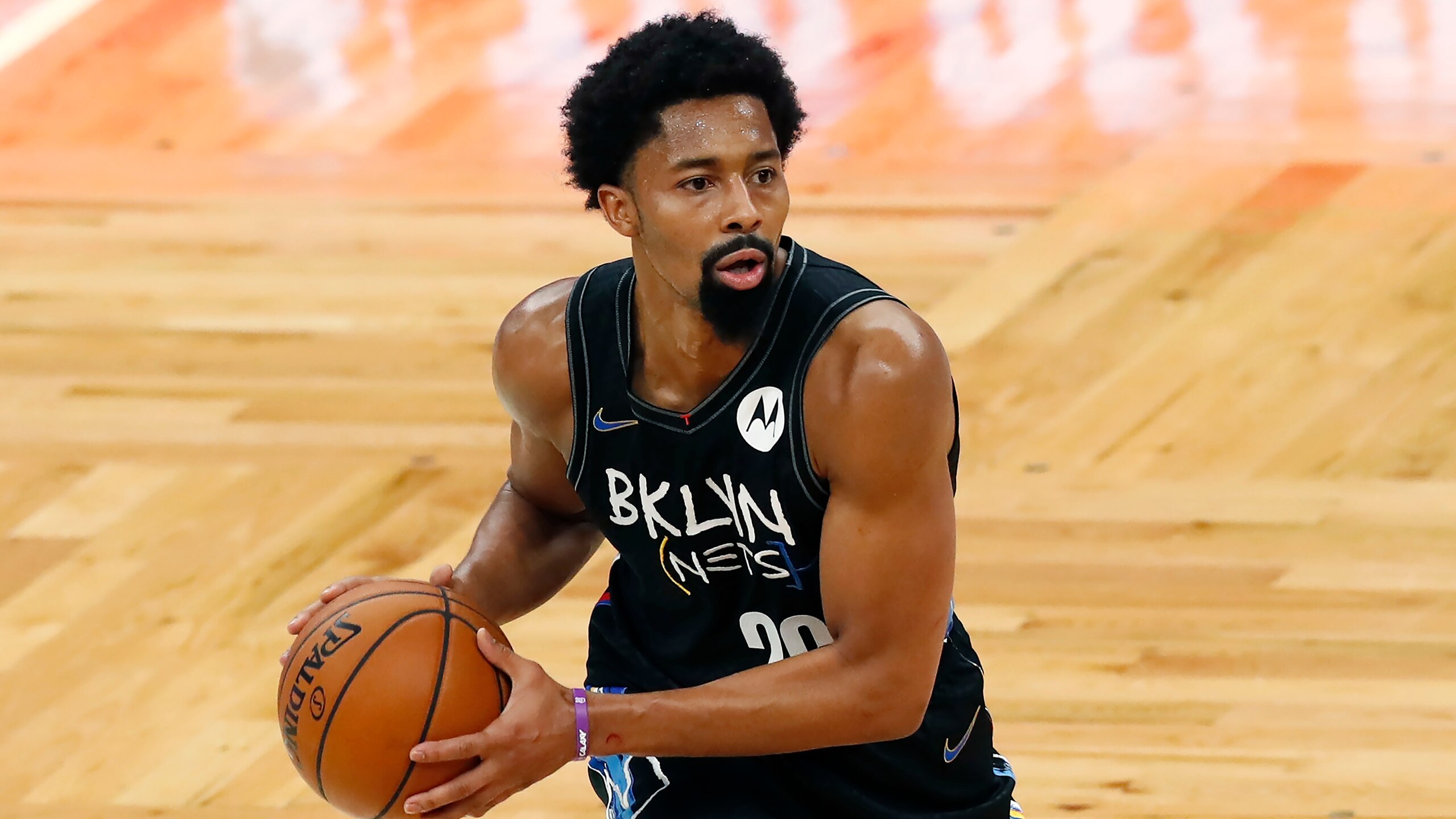 Brooklyn Nets' Spencer Dinwiddie plays against the Boston Celtics during the first half of an NBA basketball game, Friday, Dec. 25, 2020, in Boston. (AP Photo/Michael Dwyer)