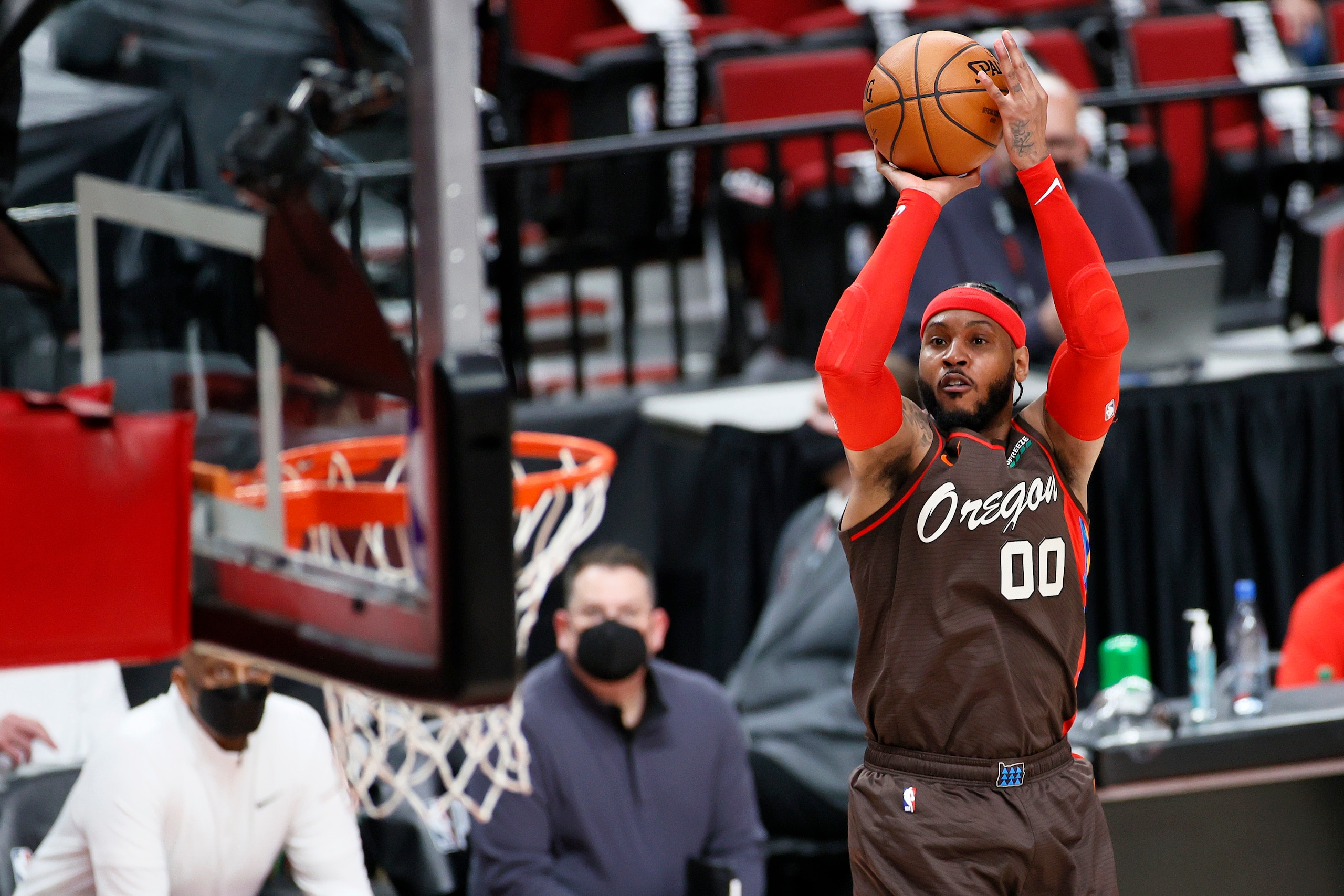 PORTLAND, OREGON - JUNE 03: Carmelo Anthony #00 of the Portland Trail Blazers shoots against the Denver Nuggets in the second quarter during Round 1, Game 6 of the 2021 NBA Playoffs at Moda Center on June 03, 2021 in Portland, Oregon. NOTE TO USER: User expressly acknowledges and agrees that, by downloading and or using this photograph, User is consenting to the terms and conditions of the Getty Images License Agreement. (Photo by Steph Chambers/Getty Images)