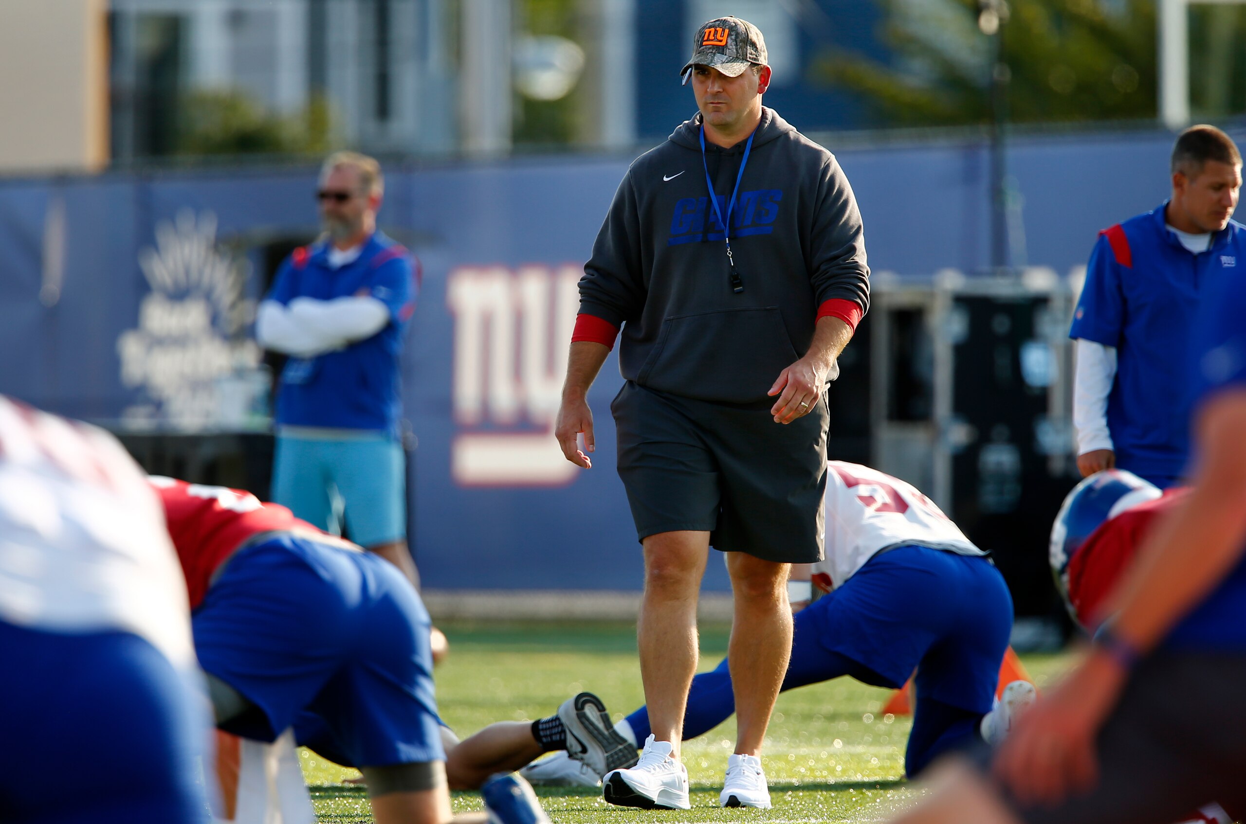 Coach Joe Judge watch the players stretch during New York Giants NFL training camp held at Eddie Moraes Stadium, Saturday, July 31, 2021, in Newark, N.J. (AP Photo/John Munson) Coach Joe Judge watch the players stretch during New York Giants NFL training camp held at Eddie Moraes Stadium, Saturday, July 31, 2021, in Newark, N.J. (AP Photo/John Munson)