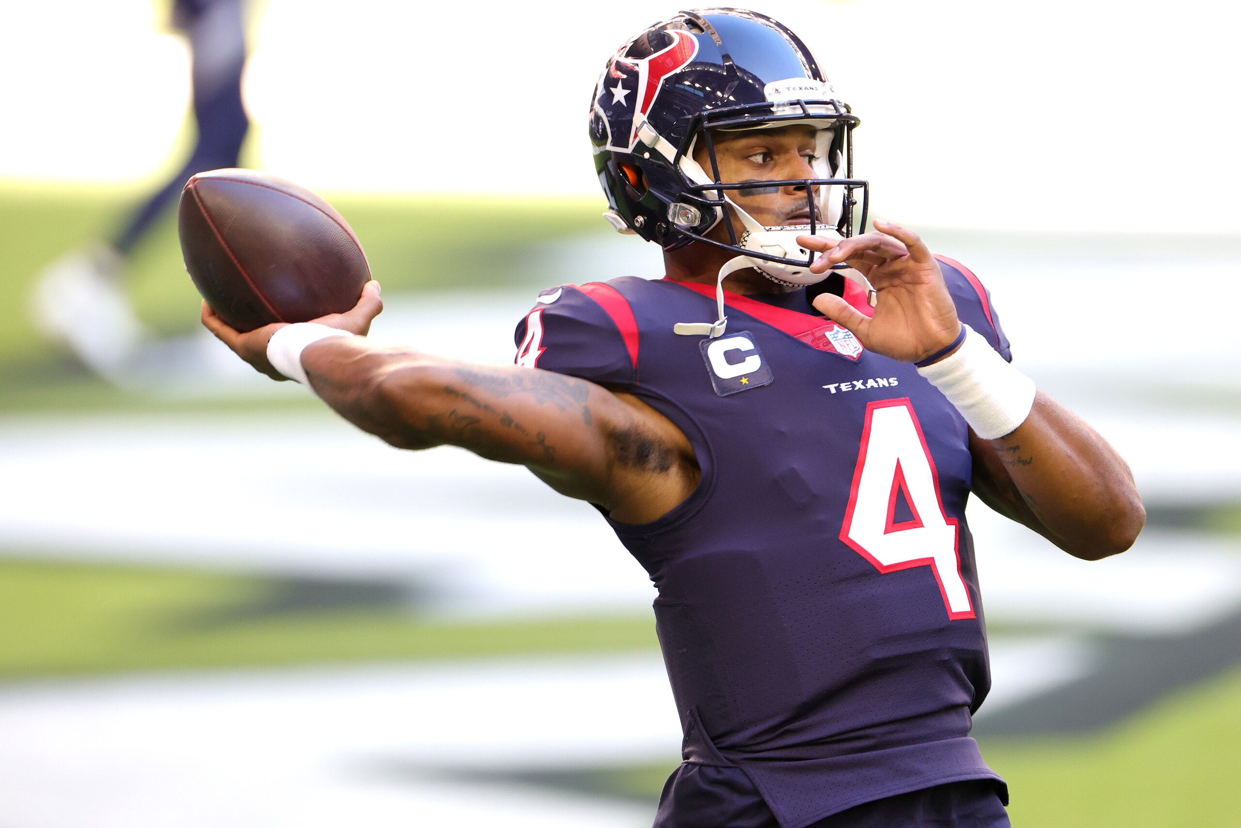 HOUSTON, TEXAS - JANUARY 03: Deshaun Watson #4 of the Houston Texans in action against the Tennessee Titans during a game at NRG Stadium on January 03, 2021 in Houston, Texas. (Photo by Carmen Mandato/Getty Images)