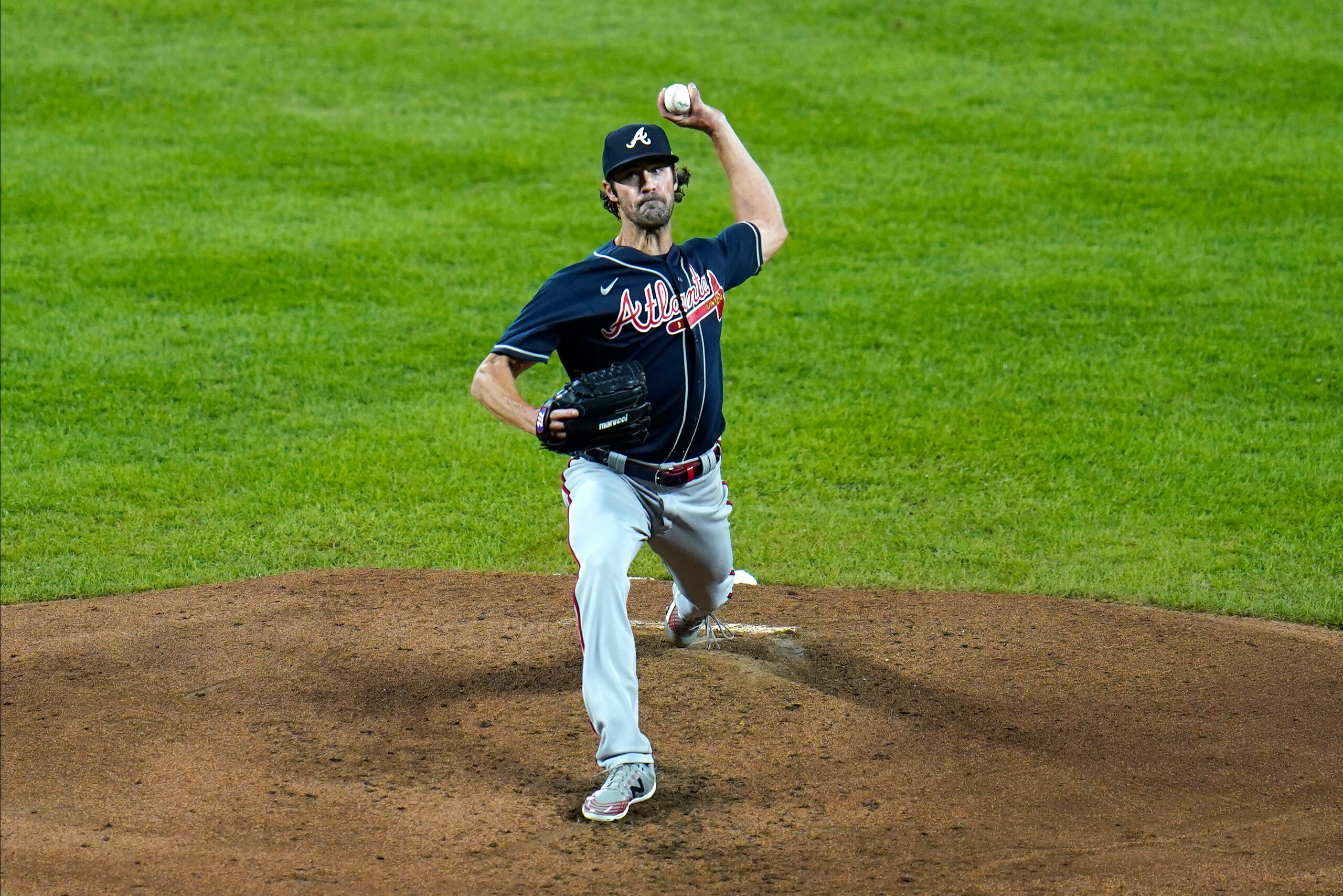 Atlanta Braves starting pitcher Cole Hamels throws a pitch to the Baltimore Orioles during the third inning of a baseball game, Wednesday, Sept. 16, 2020, in Baltimore. (AP Photo/Julio Cortez)