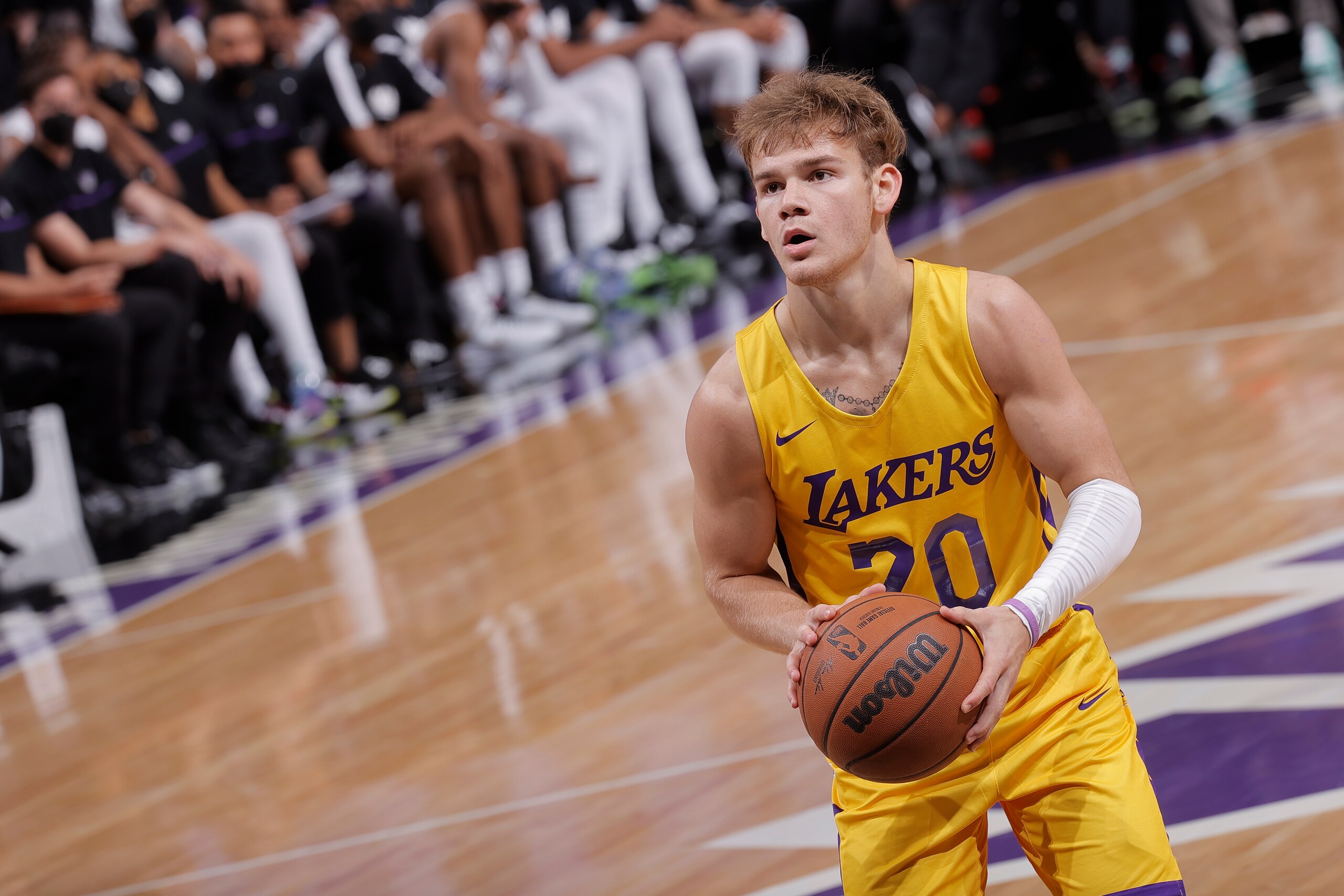 SACRAMENTO, CA - AUGUST 4: Mac McClung #20 of the Los Angeles Lakers shoots a free throw against the Sacramento Kings during the 2021 California Classic Summer League on August 4, 2021 at Golden 1 Center in Sacramento, California. NOTE TO USER: User expressly acknowledges and agrees that, by downloading and or using this Photograph, user is consenting to the terms and conditions of the Getty Images License Agreement. Mandatory Copyright Notice: Copyright 2021 NBAE (Photo by Rocky Widner/NBAE via Getty Images)