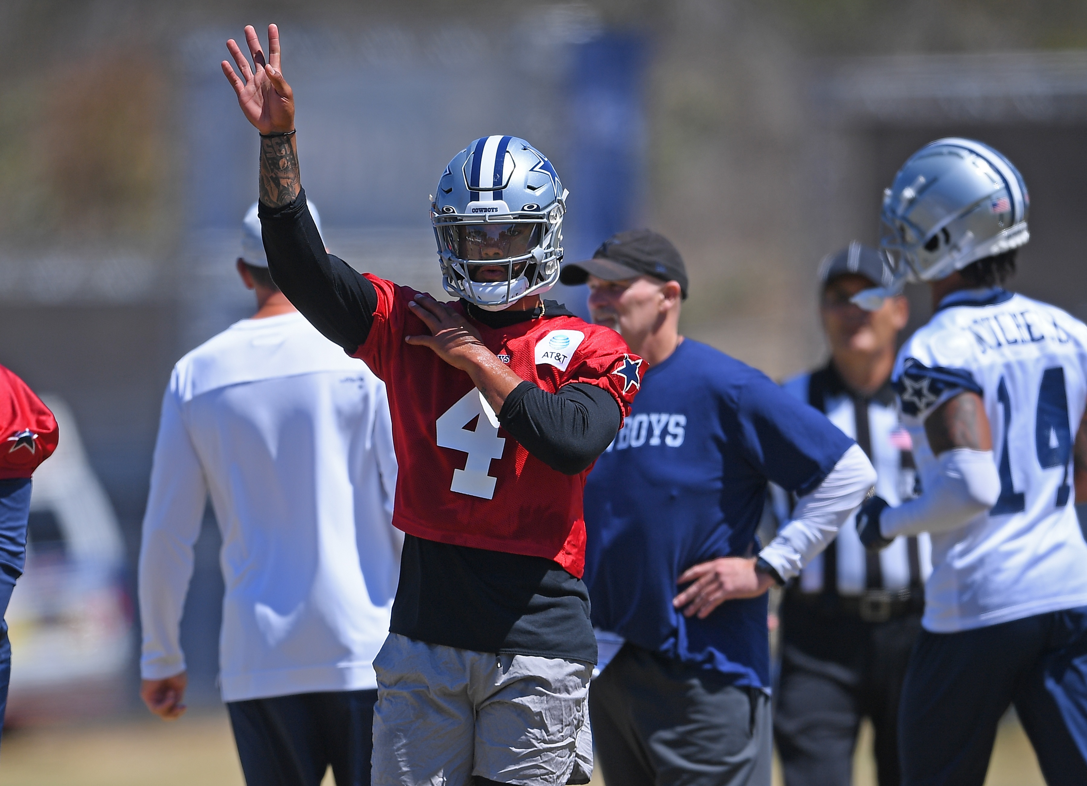 OXNARD, CA - AUGUST 03: Quarterback Dak Prescott #4 of the Dallas Cowboys stretches on the field during practice at River Ridge Complex on August 3, 2021 in Oxnard, California. (Photo by Jayne Kamin-Oncea/Getty Images)