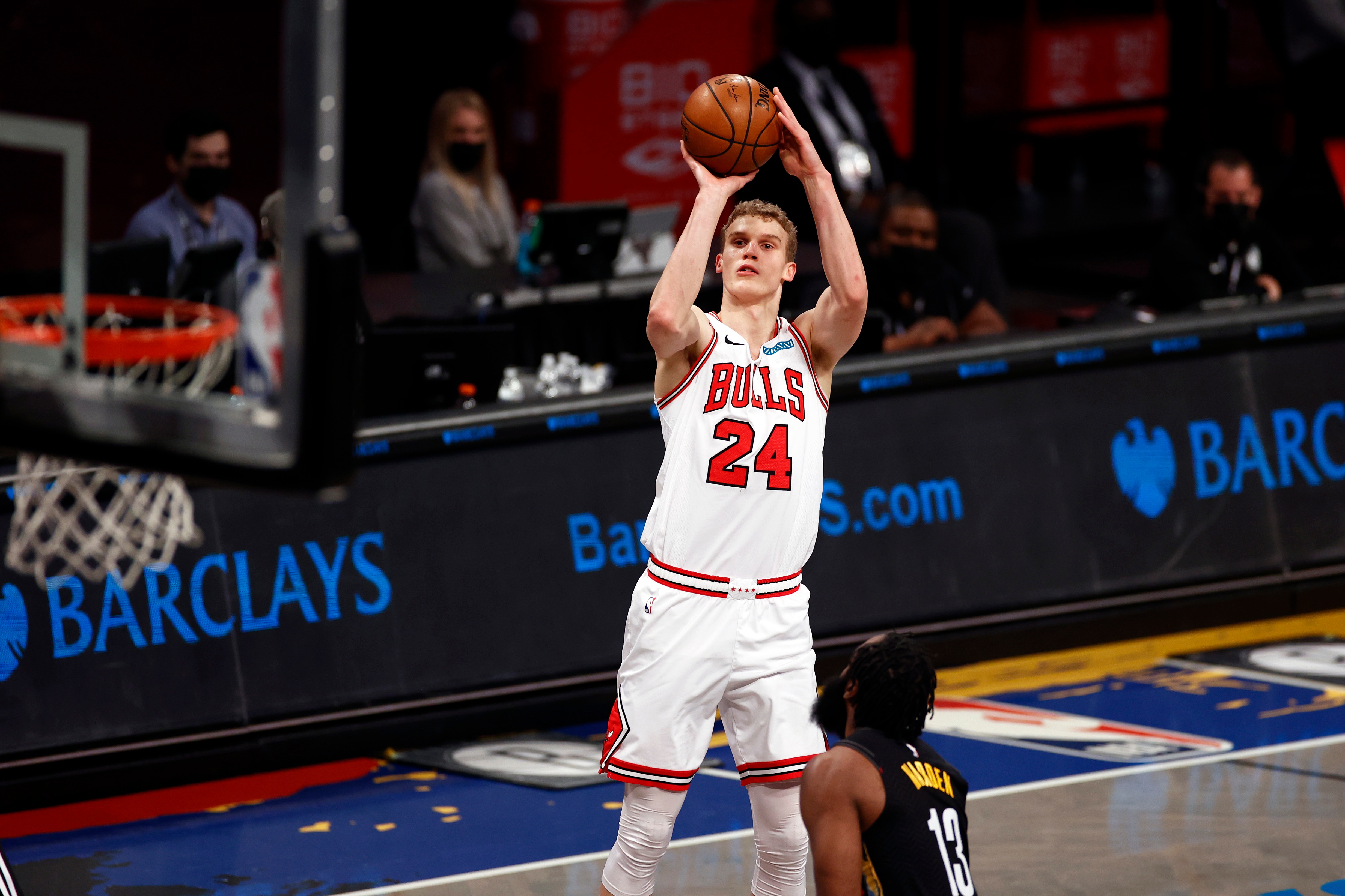 Chicago Bulls forward Lauri Markkanen (24) shoots over Brooklyn Nets guard James Harden during the first half of an NBA basketball game Saturday, May 15, 2021, in New York. (AP Photo/Adam Hunger)