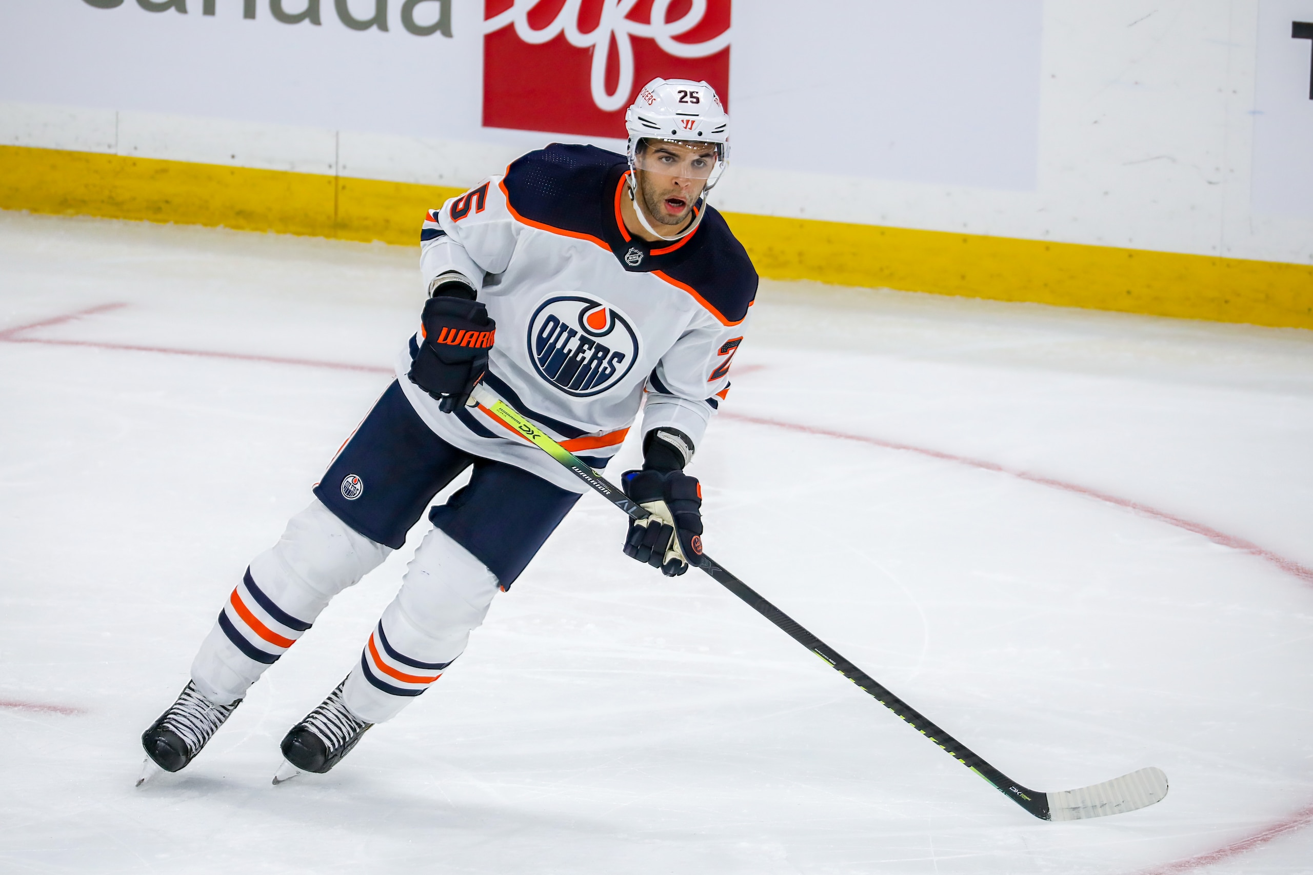 WINNIPEG, MB - MAY 24: Darnell Nurse #25 of the Edmonton Oilers keeps an eye on the play during action in the second overtime period against the Winnipeg Jets in Game Four of the First Round of the 2021 Stanley Cup Playoffs at Bell MTS Place on May 24, 2021 in Winnipeg, Manitoba. (Photo by Jonathan Kozub/NHLI via Getty Images)