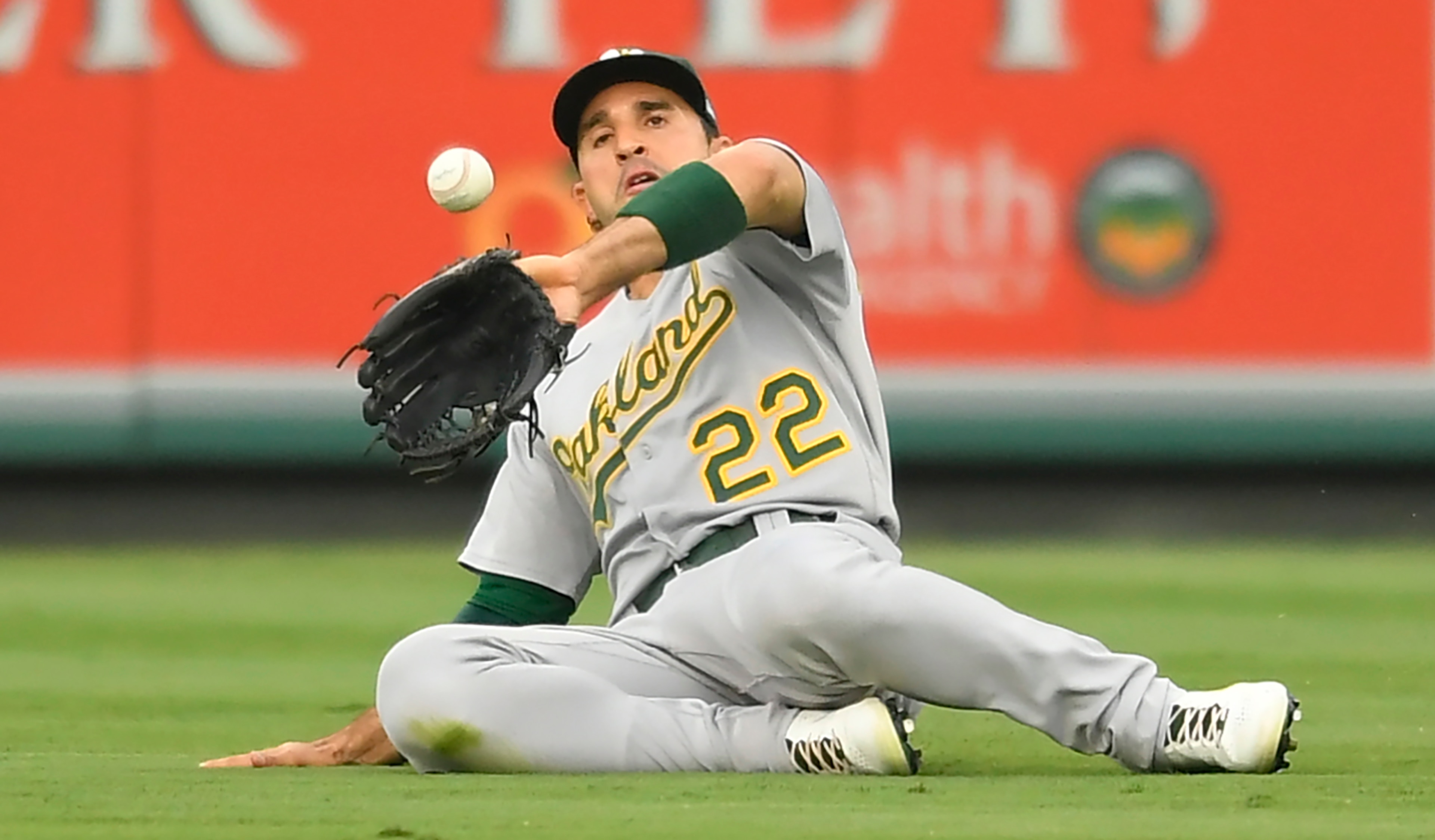 Oakland Athletics center fielder Ramon Laureano catches a fly ball hit by Los Angeles Angels' Phil Gosselin during the first inning of a baseball game Friday, July 30, 2021, in Anaheim, Calif. (AP Photo/John McCoy)