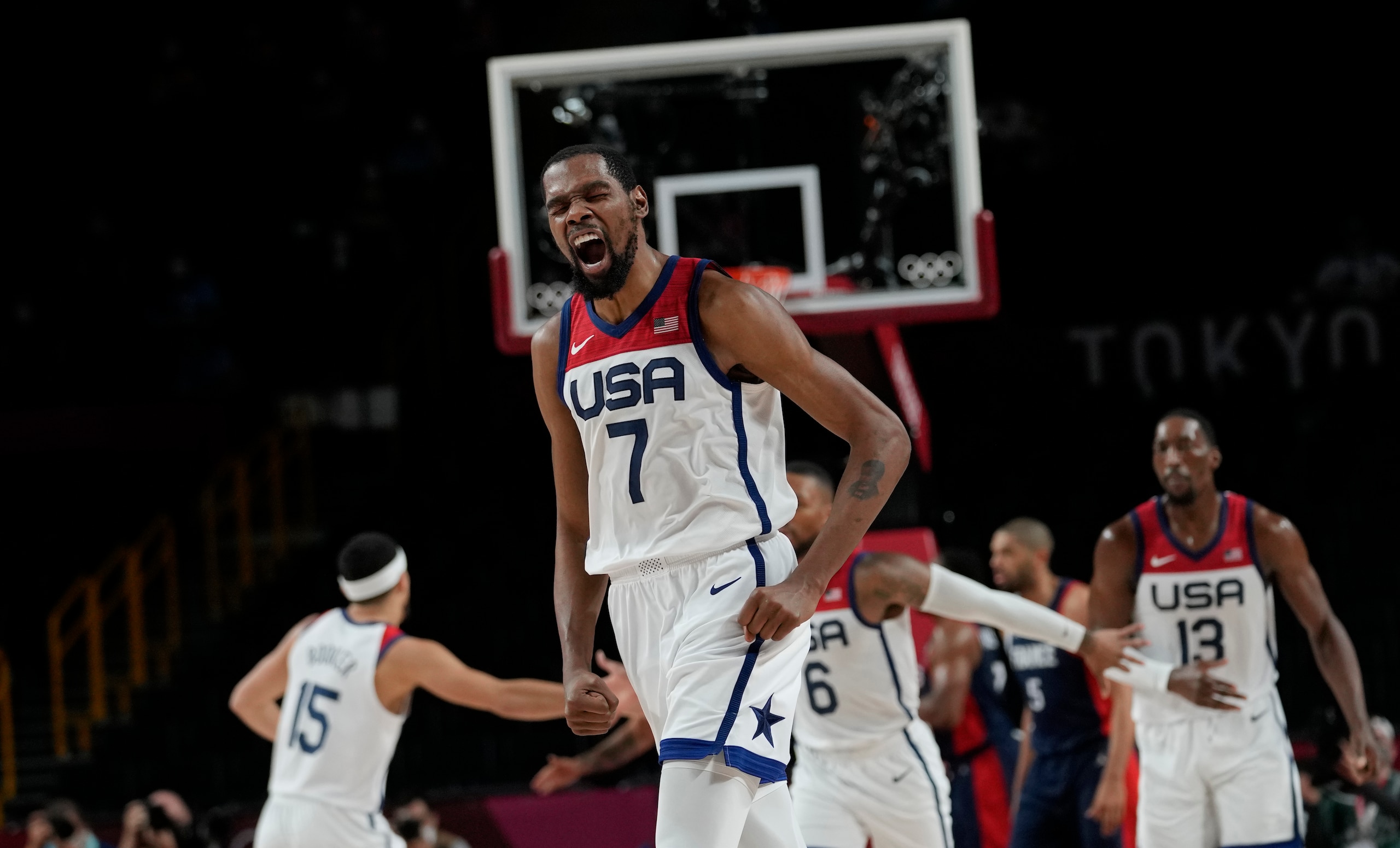 United States' Kevin Durant (7) celebrates after a score during men's basketball gold medal game against France at the 2020 Summer Olympics, Saturday, Aug. 7, 2021, in Saitama, Japan. (AP Photo/Eric Gay) United States' Kevin Durant (7) celebrates after a score during men's basketball gold medal game against France at the 2020 Summer Olympics, Saturday, Aug. 7, 2021, in Saitama, Japan. (AP Photo/Eric Gay)