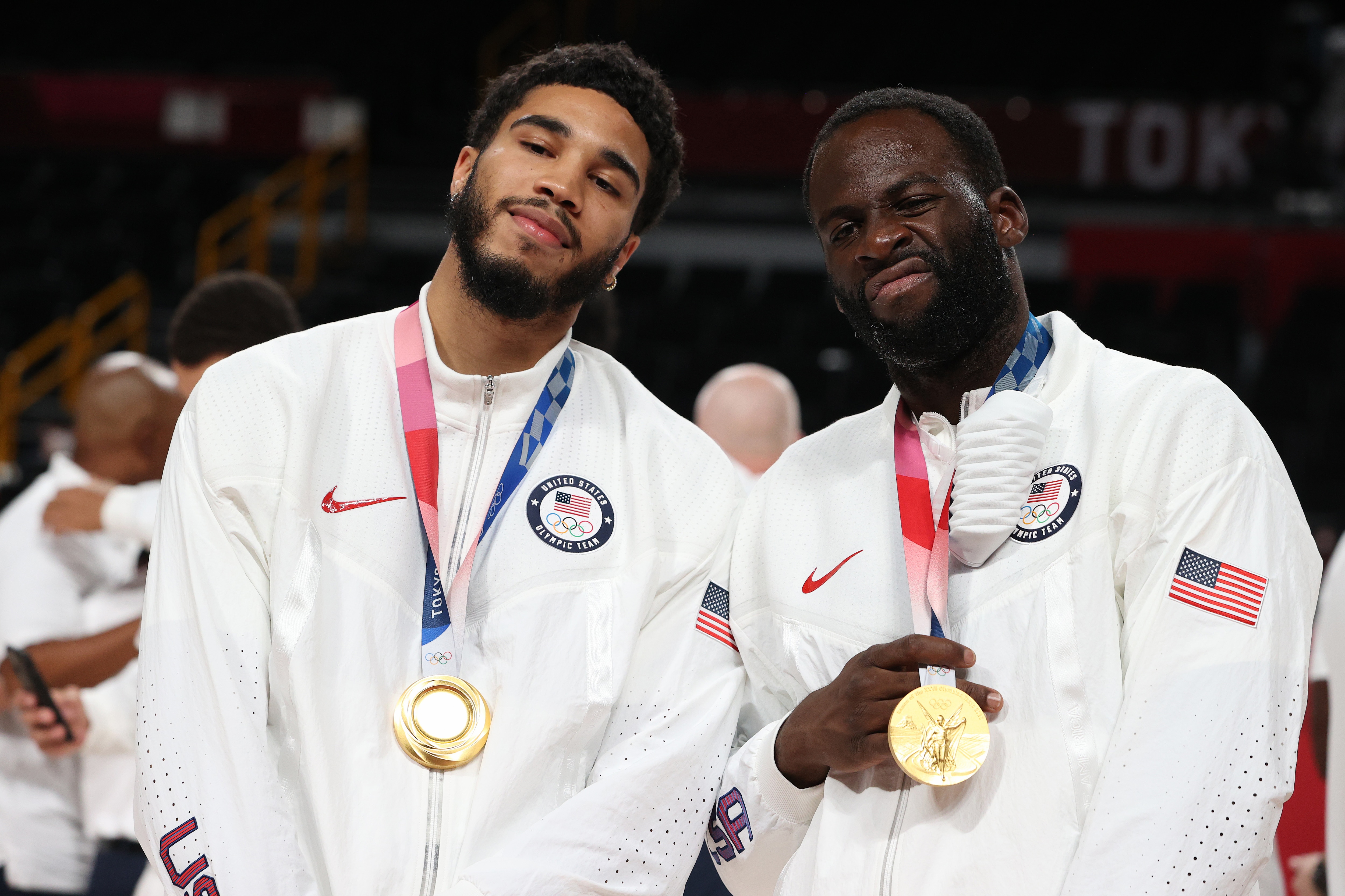 SAITAMA, JAPAN - AUGUST 07: Jayson Tatum and Draymond Green of Team United States  pose for photographs with their gold medals  during the Men's Basketball medal ceremony on day fifteen of the Tokyo 2020 Olympic Games at Saitama Super Arena on August 07, 2021 in Saitama, Japan. (Photo by Kevin C. Cox/Getty Images)