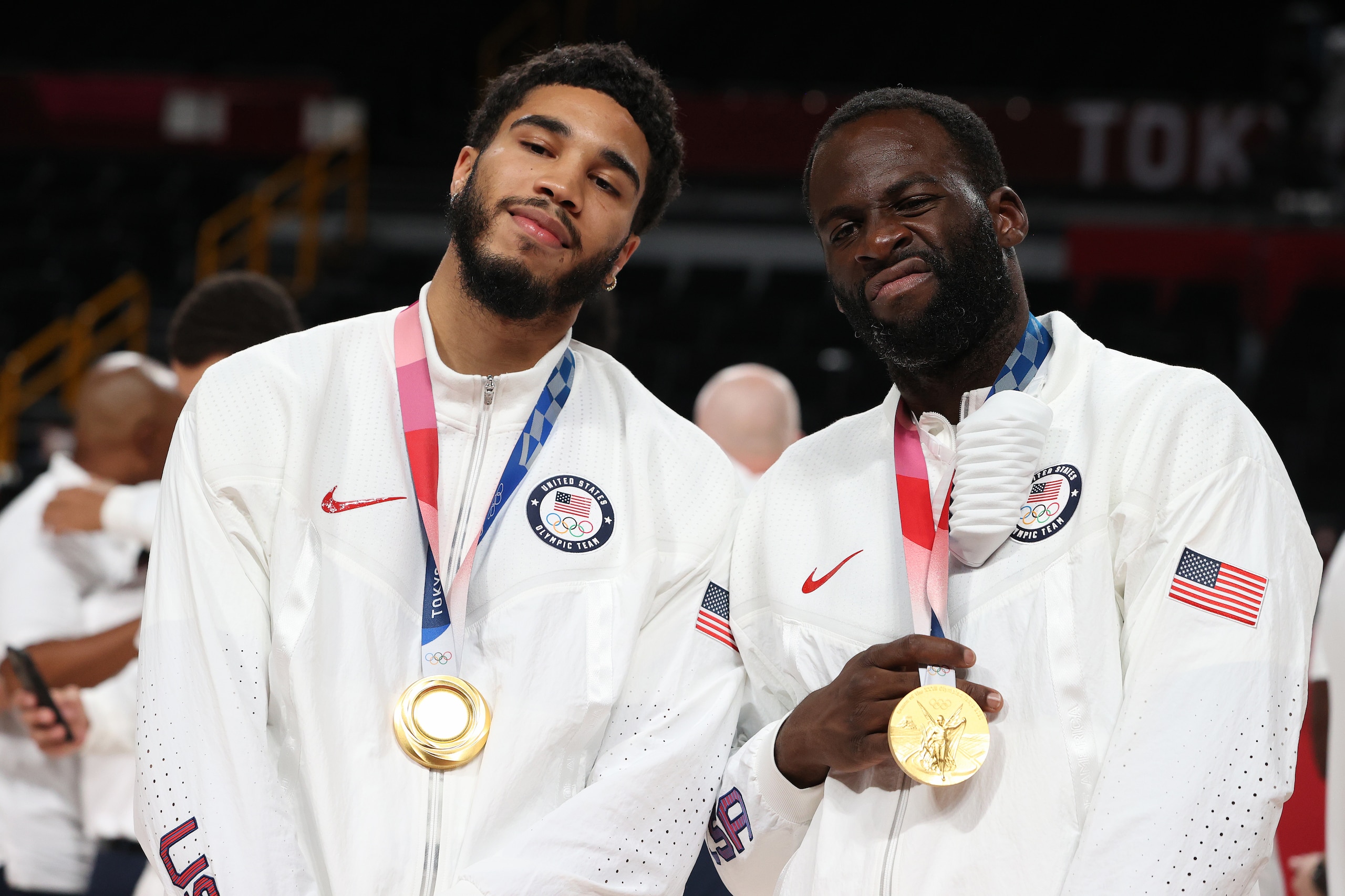 SAITAMA, JAPAN - AUGUST 07: Jayson Tatum and Draymond Green of Team United States  pose for photographs with their gold medals  during the Men's Basketball medal ceremony on day fifteen of the Tokyo 2020 Olympic Games at Saitama Super Arena on August 07, 2021 in Saitama, Japan. (Photo by Kevin C. Cox/Getty Images)