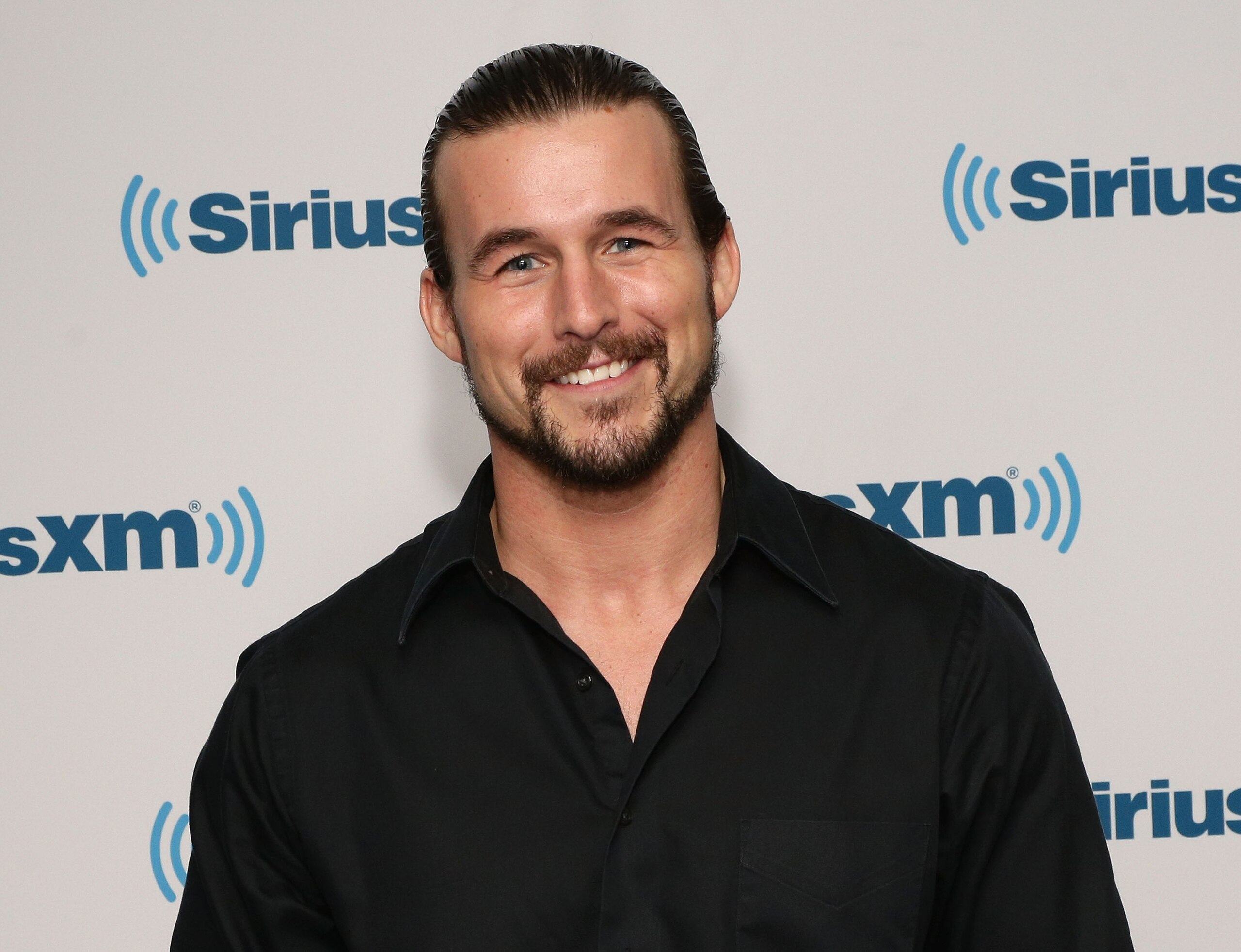 NEW YORK, NY - MAY 15:  Wrestler Adam Cole from Ring Of Honor visits SiriusXM Studios on May 15, 2014 in New York City.  (Photo by Andrew Toth/Getty Images)