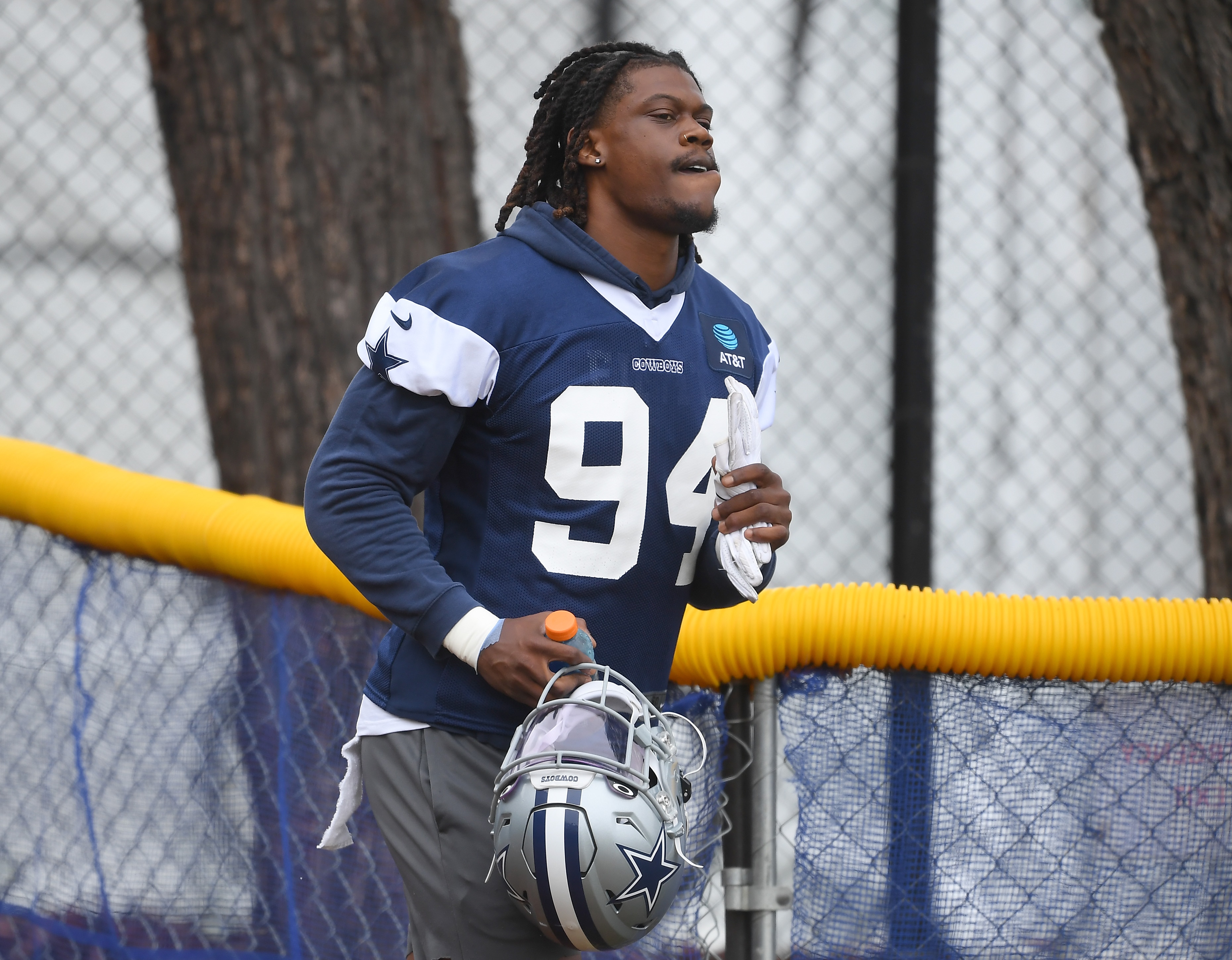 OXNARD, CA - JULY 24: Defensive end Randy Gregory #94 of the Dallas Cowboys runs on to the field for training camp at River Ridge Complex on July 24, 2021 in Oxnard, California. (Photo by Jayne Kamin-Oncea/Getty Images)