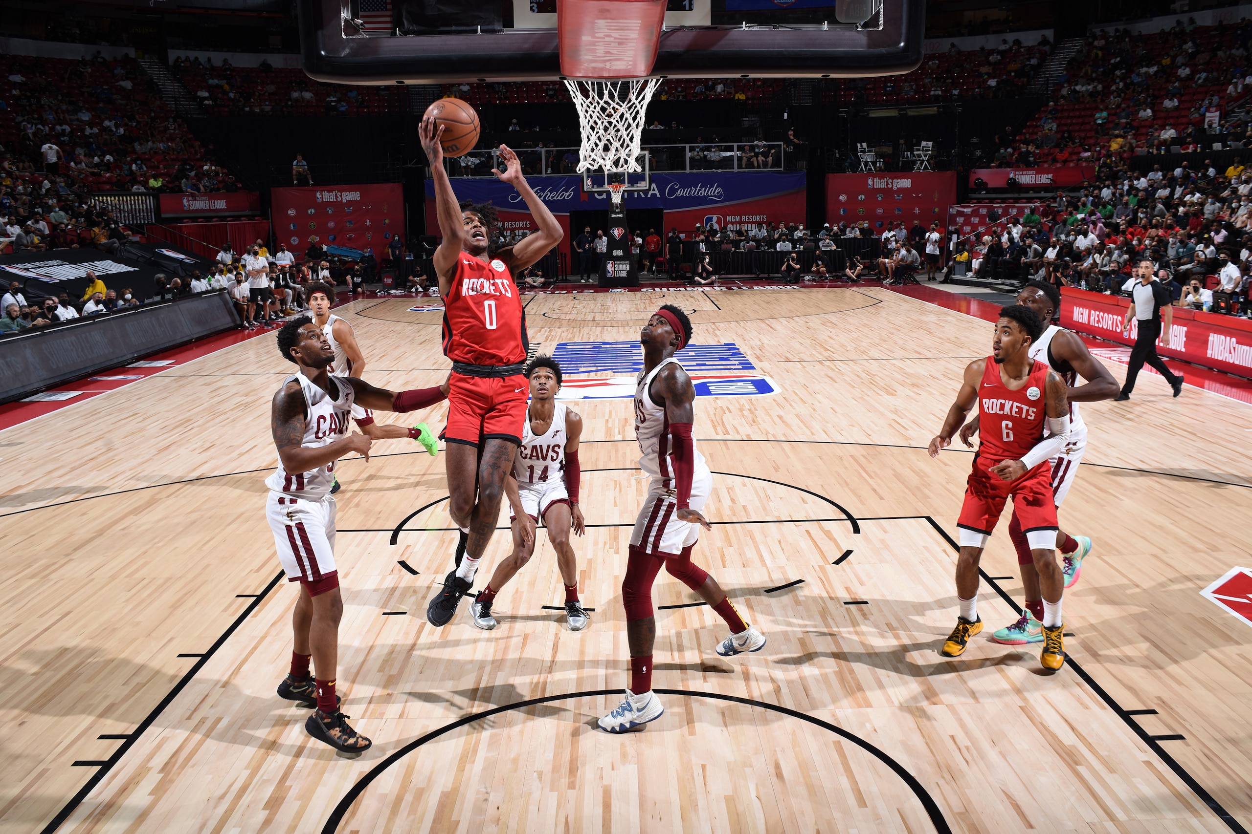 LAS VEGAS, NV - AUGUST 8:  Jalen Green #0 of the Houston Rockets drives to the basket against the Cleveland Cavaliers during the 2021 Las Vegas Summer League on August 8, 2021 at the Thomas & Mack Center in Las Vegas, Nevada. NOTE TO USER: User expressly acknowledges and agrees that, by downloading and or using this Photograph, User is consenting to the terms and conditions of the Getty Images License Agreement. Mandatory Copyright Notice: Copyright 2021 NBAE (Photo by Bart Young/NBAE via Getty Images)