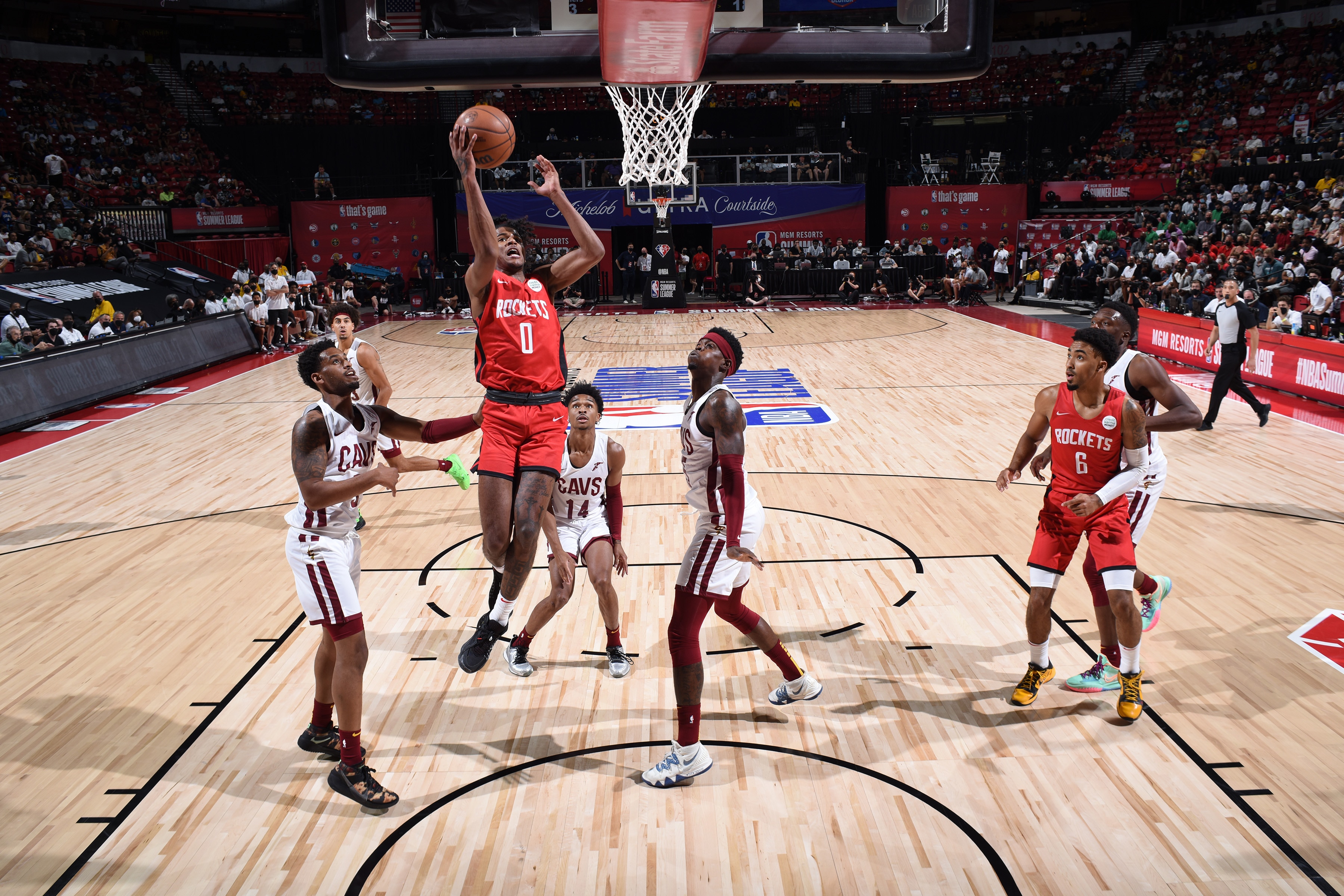 LAS VEGAS, NV - AUGUST 8:  Jalen Green #0 of the Houston Rockets drives to the basket against the Cleveland Cavaliers during the 2021 Las Vegas Summer League on August 8, 2021 at the Thomas & Mack Center in Las Vegas, Nevada. NOTE TO USER: User expressly acknowledges and agrees that, by downloading and or using this Photograph, User is consenting to the terms and conditions of the Getty Images License Agreement. Mandatory Copyright Notice: Copyright 2021 NBAE (Photo by Bart Young/NBAE via Getty Images)