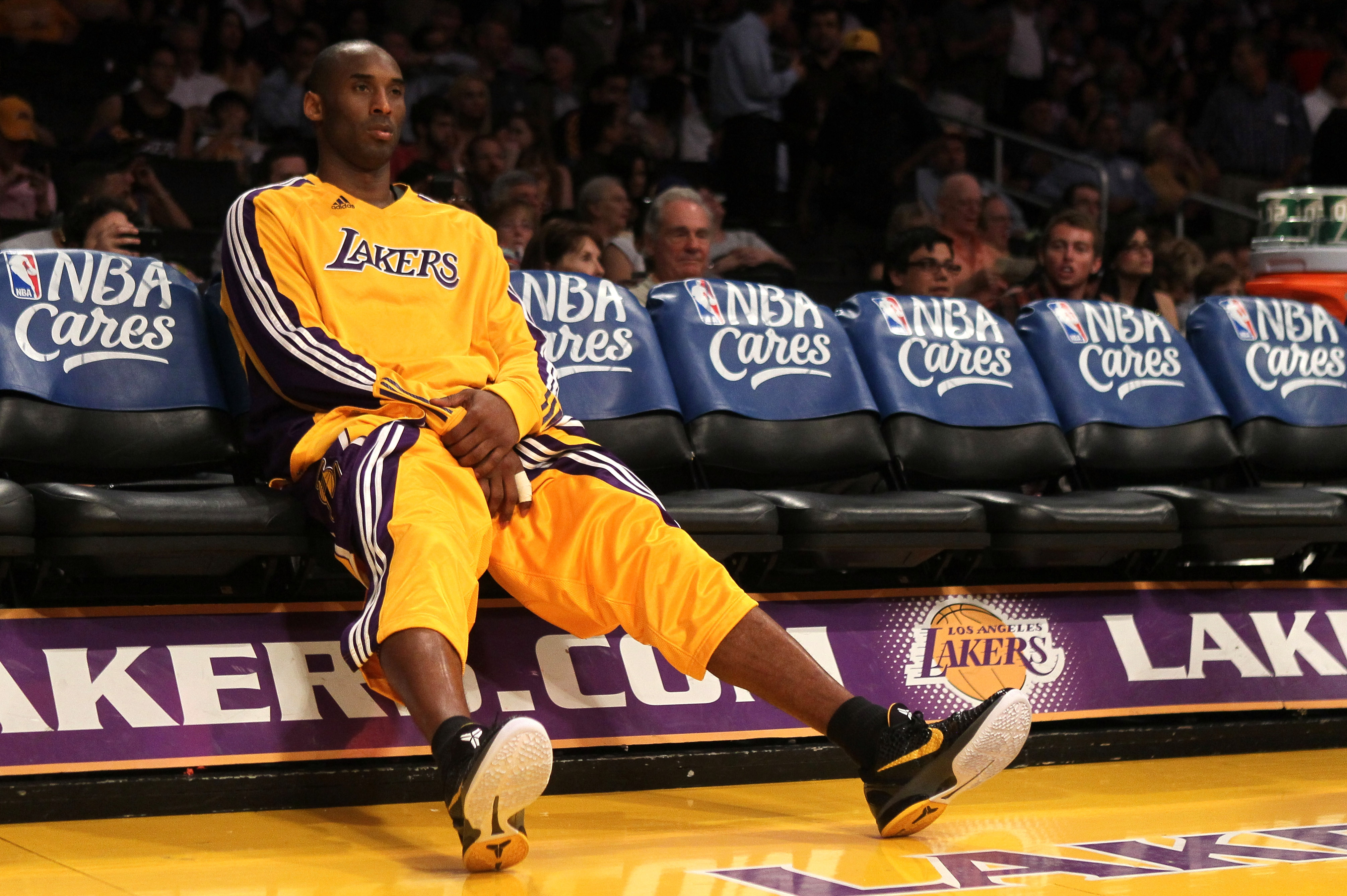 LOS ANGELES, CA - MAY 04:  Kobe Bryant #24 of the Los Angeles Lakers sits on the bench alone before the start of the third quarter against the Dallas Mavericks in Game Two of the Western Conference Semifinals in the 2011 NBA Playoffs at Staples Center on May 4, 2011 in Los Angeles, California. NOTE TO USER: User expressly acknowledges and agrees that, by downloading and or using this photograph, User is consenting to the terms and conditions of the Getty Images License Agreement.  (Photo by Stephen Dunn/Getty Images)