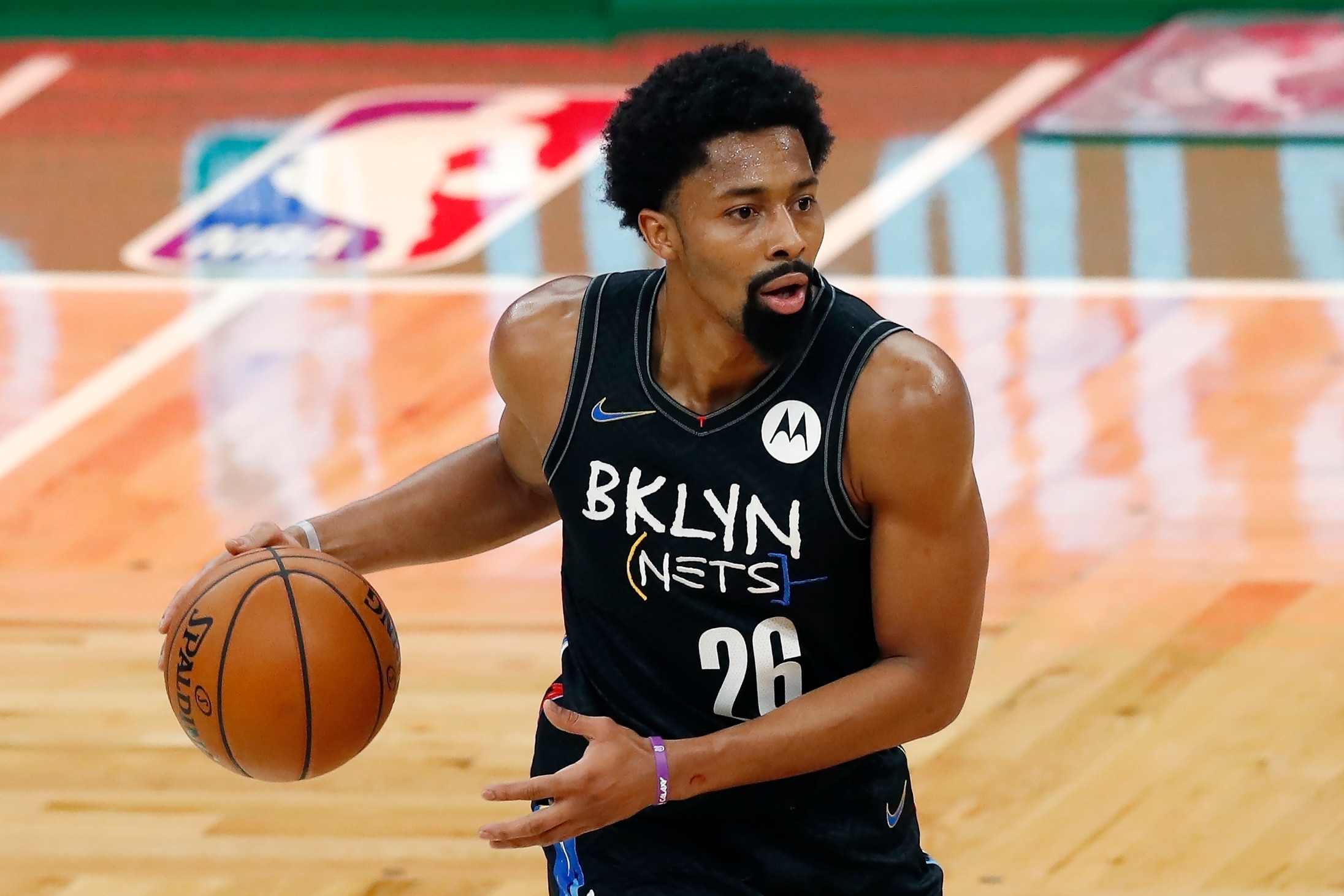 Brooklyn Nets' Spencer Dinwiddie plays against the Boston Celtics during the first half of an NBA basketball game, Friday, Dec. 25, 2020, in Boston. (AP Photo/Michael Dwyer)