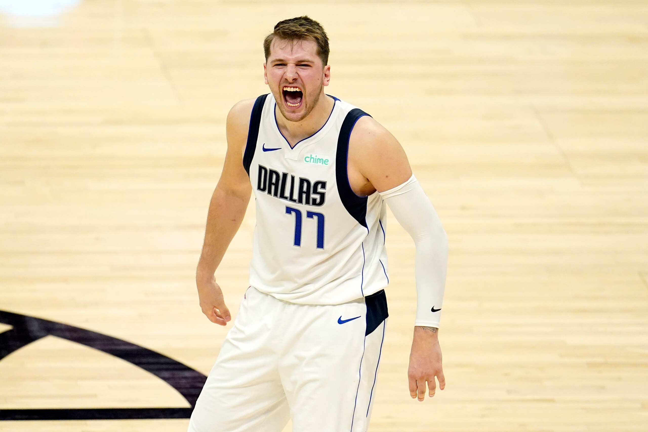 Dallas Mavericks guard Luka Doncic (77) celebrates in the closing minutes of a win over the Los Angeles Clippers during Game 2 of an NBA basketball first-round playoff series Tuesday, May 25, 2021, in Los Angeles. (AP Photo/Marcio Jose Sanchez) Dallas Mavericks guard Luka Doncic (77) celebrates in the closing minutes of a win over the Los Angeles Clippers during Game 2 of an NBA basketball first-round playoff series Tuesday, May 25, 2021, in Los Angeles. (AP Photo/Marcio Jose Sanchez)
