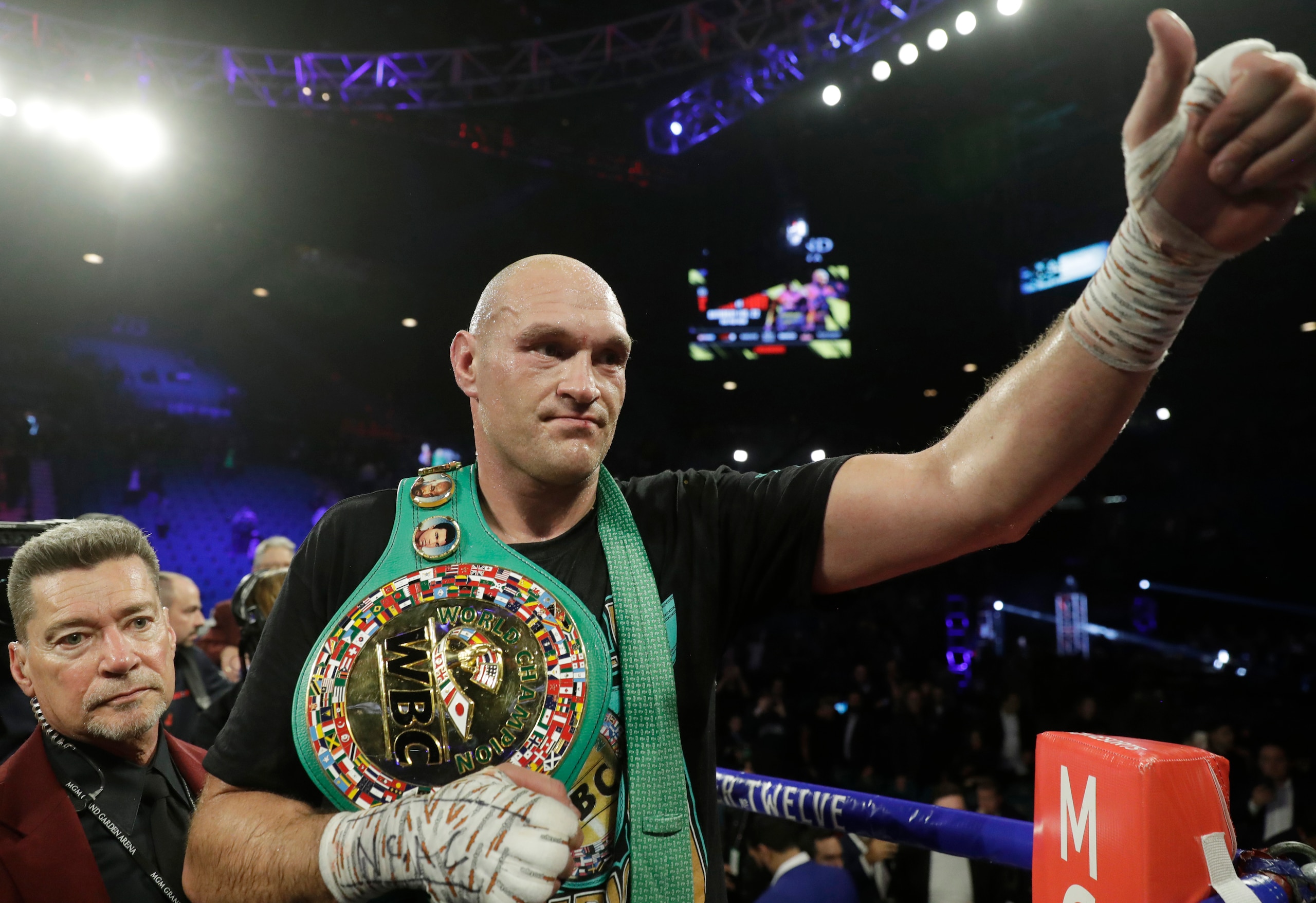 Tyson Fury, of England, celebrates after defeating Deontay Wilder during a WBC heavyweight championship boxing match Saturday, Feb. 22, 2020, in Las Vegas. (AP Photo/Isaac Brekken)