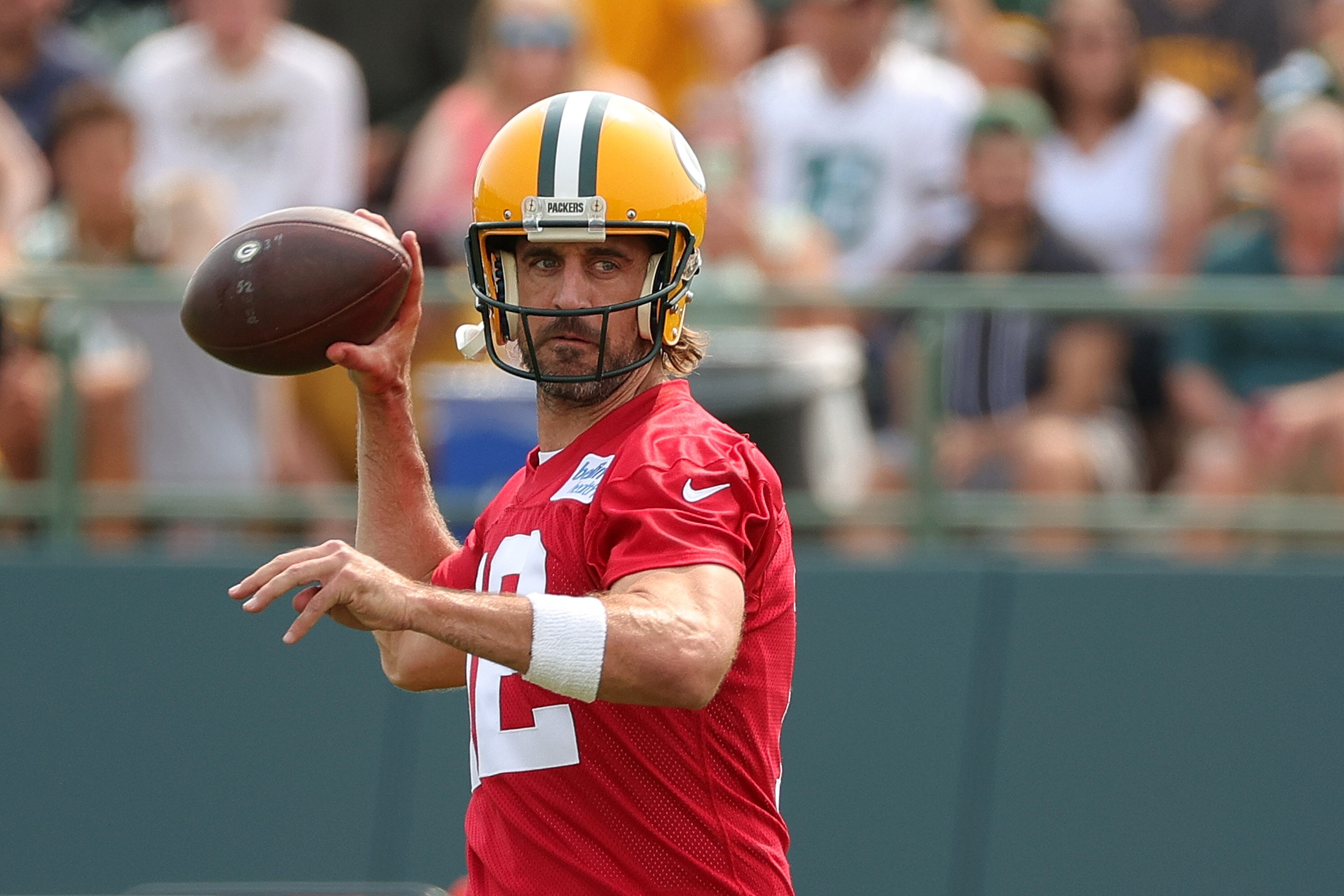 ASHWAUBENON, WISCONSIN - JULY 28:  Aaron Rodgers #12 of the Green Bay Packers works out during training camp at Ray Nitschke Field on July 28, 2021 in Ashwaubenon, Wisconsin. (Photo by Stacy Revere/Getty Images)