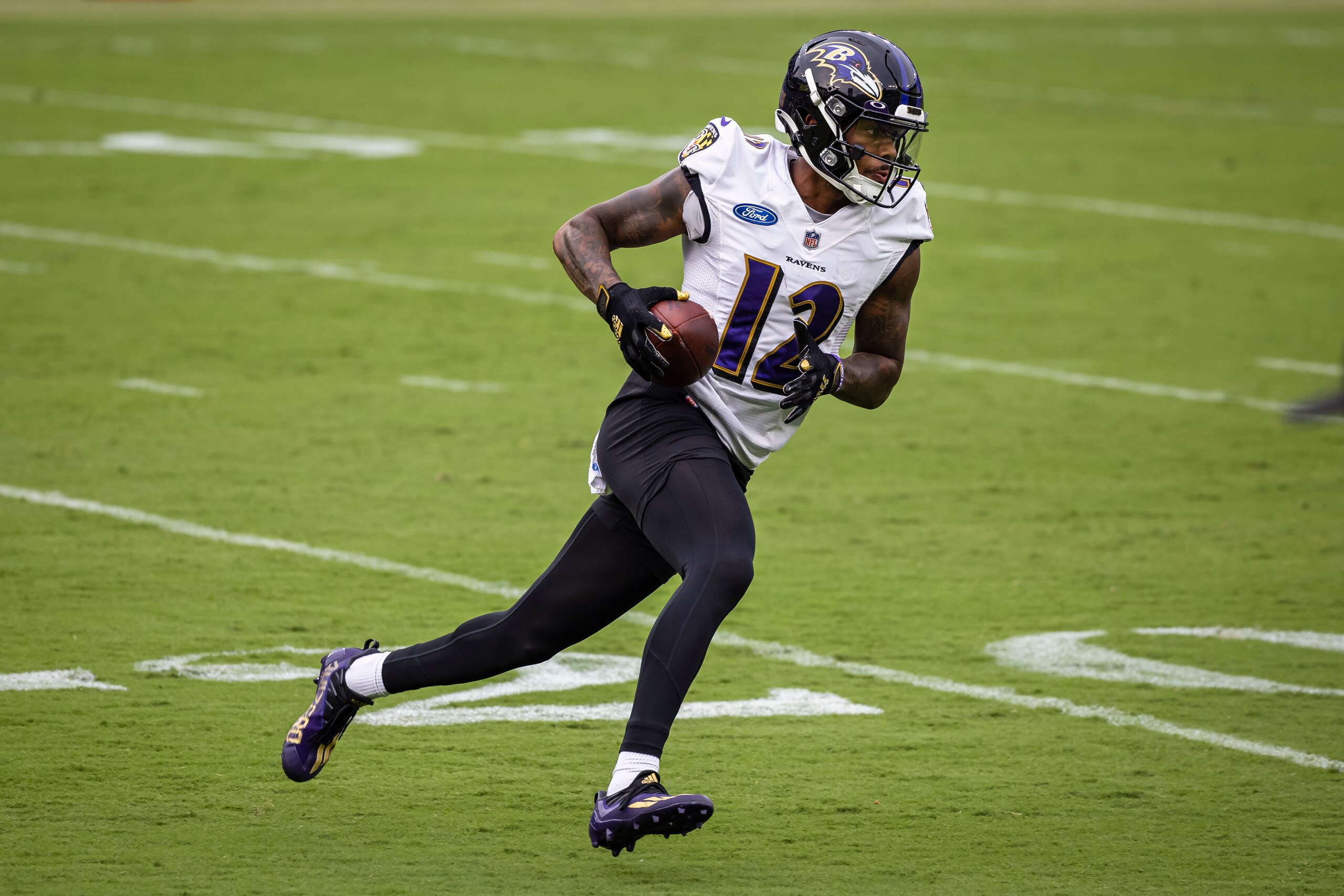 BALTIMORE, MD - JULY 31: Rashod Bateman #12 of the Baltimore Ravens in action during training camp at M&T Bank Stadium on July 31, 2021 in Baltimore, Maryland. (Photo by Scott Taetsch/Getty Images)