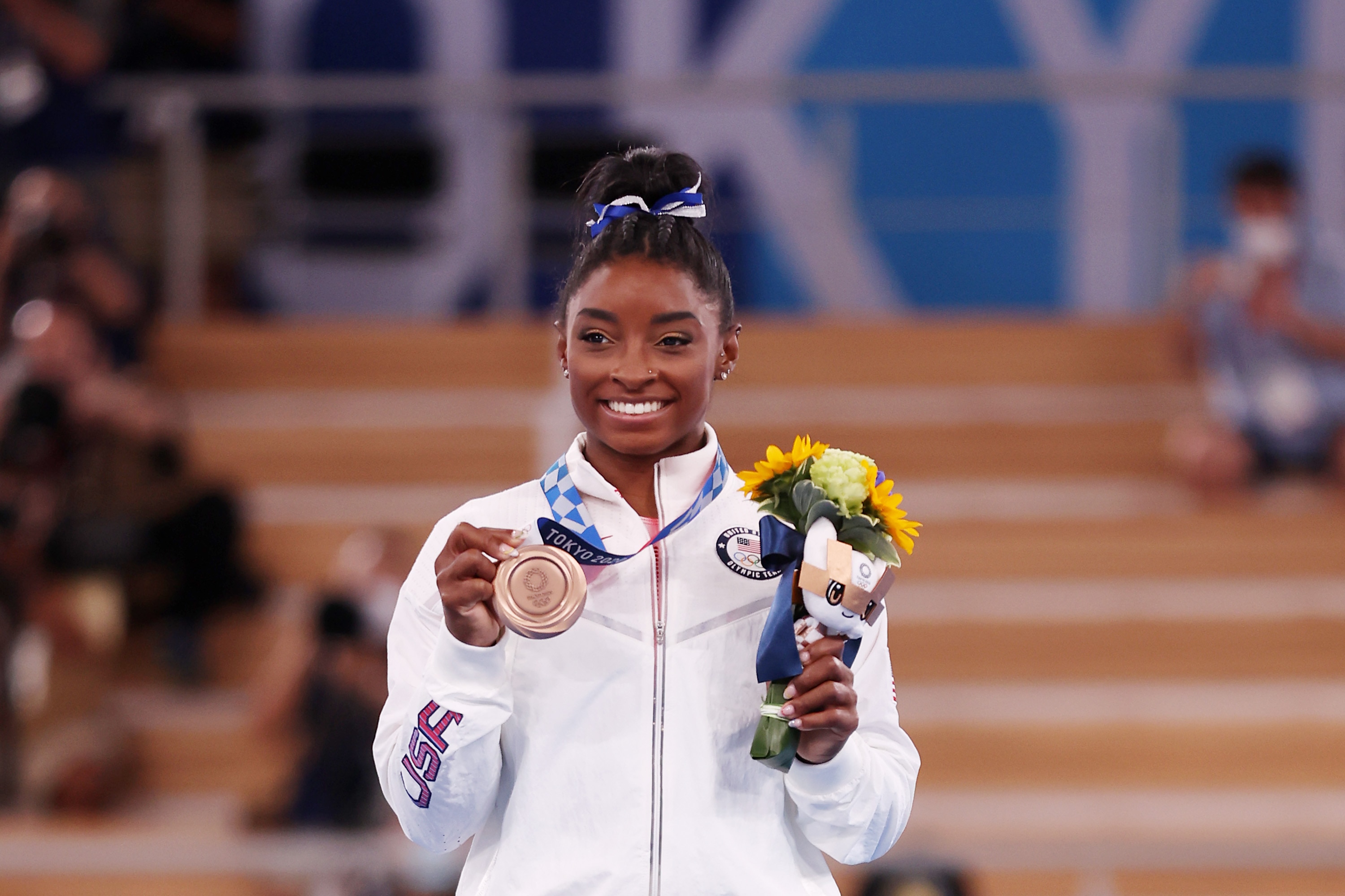 TOKYO, JAPAN - AUGUST 03: Simone Biles of Team United States poses with the bronze medal during the Women's Balance Beam Final medal ceremony on day eleven of the Tokyo 2020 Olympic Games at Ariake Gymnastics Centre on August 03, 2021 in Tokyo, Japan. (Photo by Jamie Squire/Getty Images)